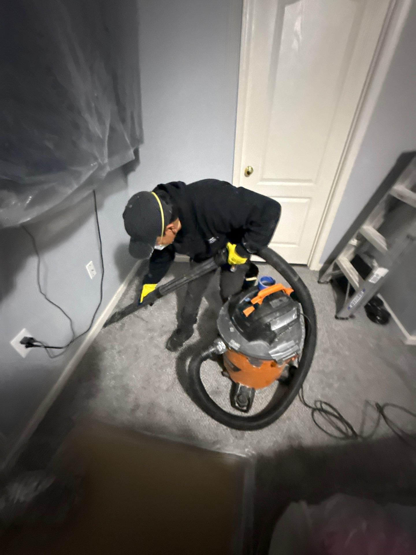 Removed ceiling materials staged for disposal during water restoration work.
