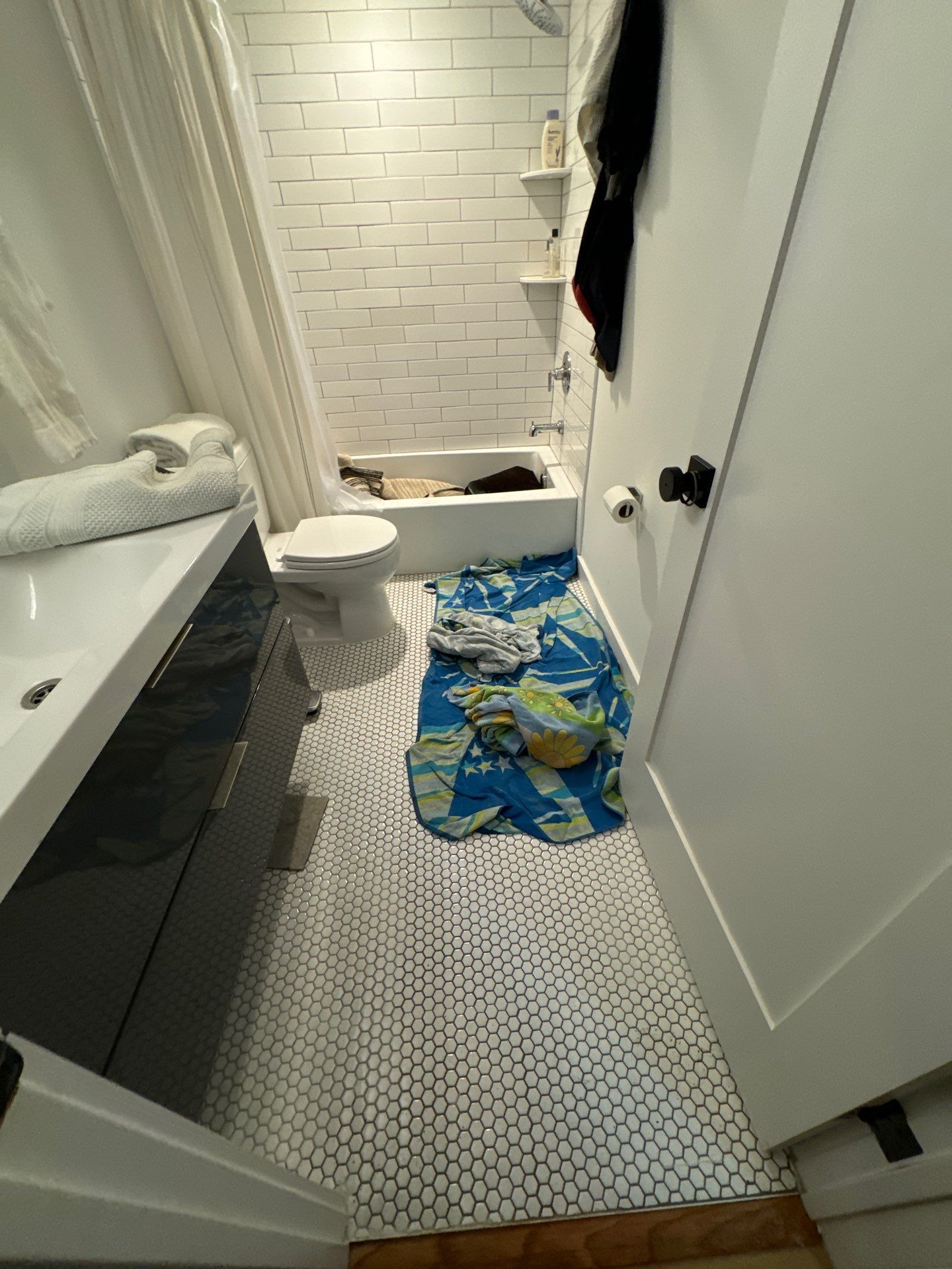 Wet carpet and flooring materials removed and staged for remediation in Arlington restoration project.