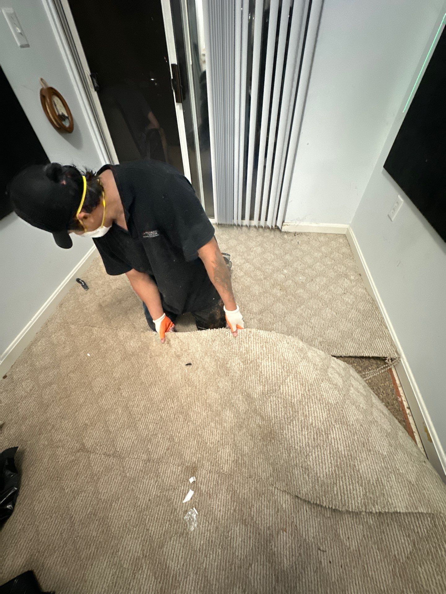 Mid-stage drying shows dehumidifiers and air movers working to extract residual moisture from affected areas.