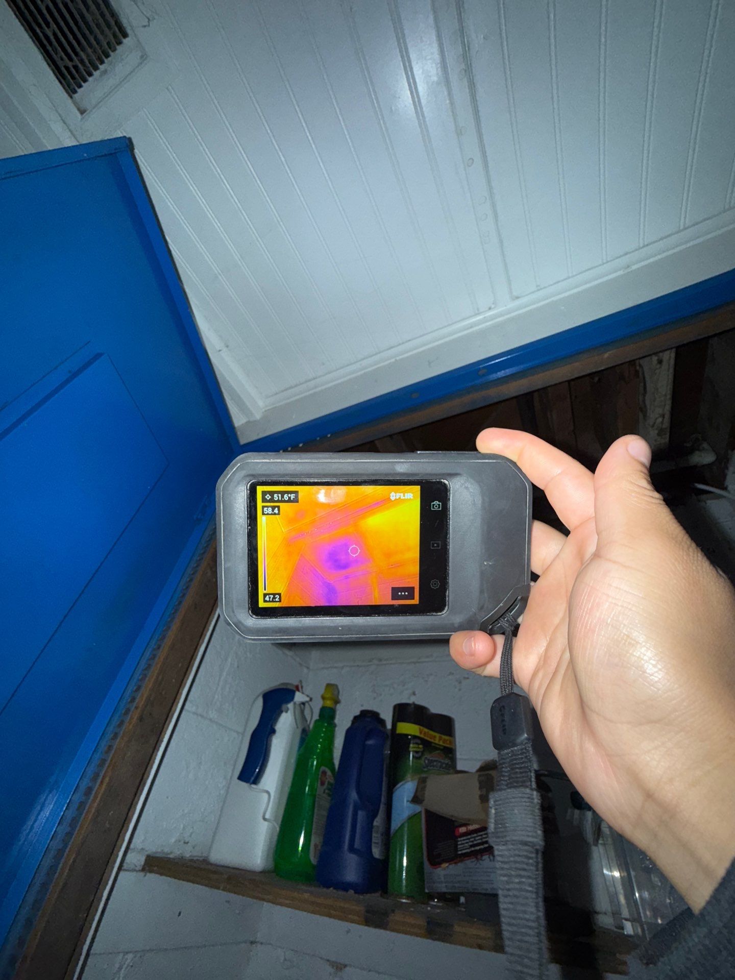 Containment and remediation work underway on affected ceiling cavity during mold removal process.