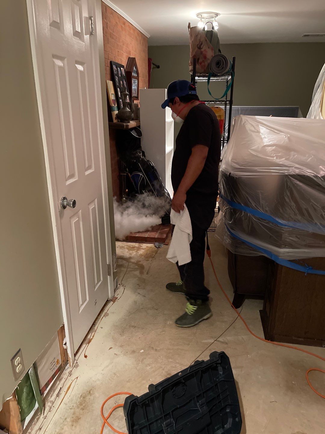 Moisture mapping in progress across affected building materials and cavities.