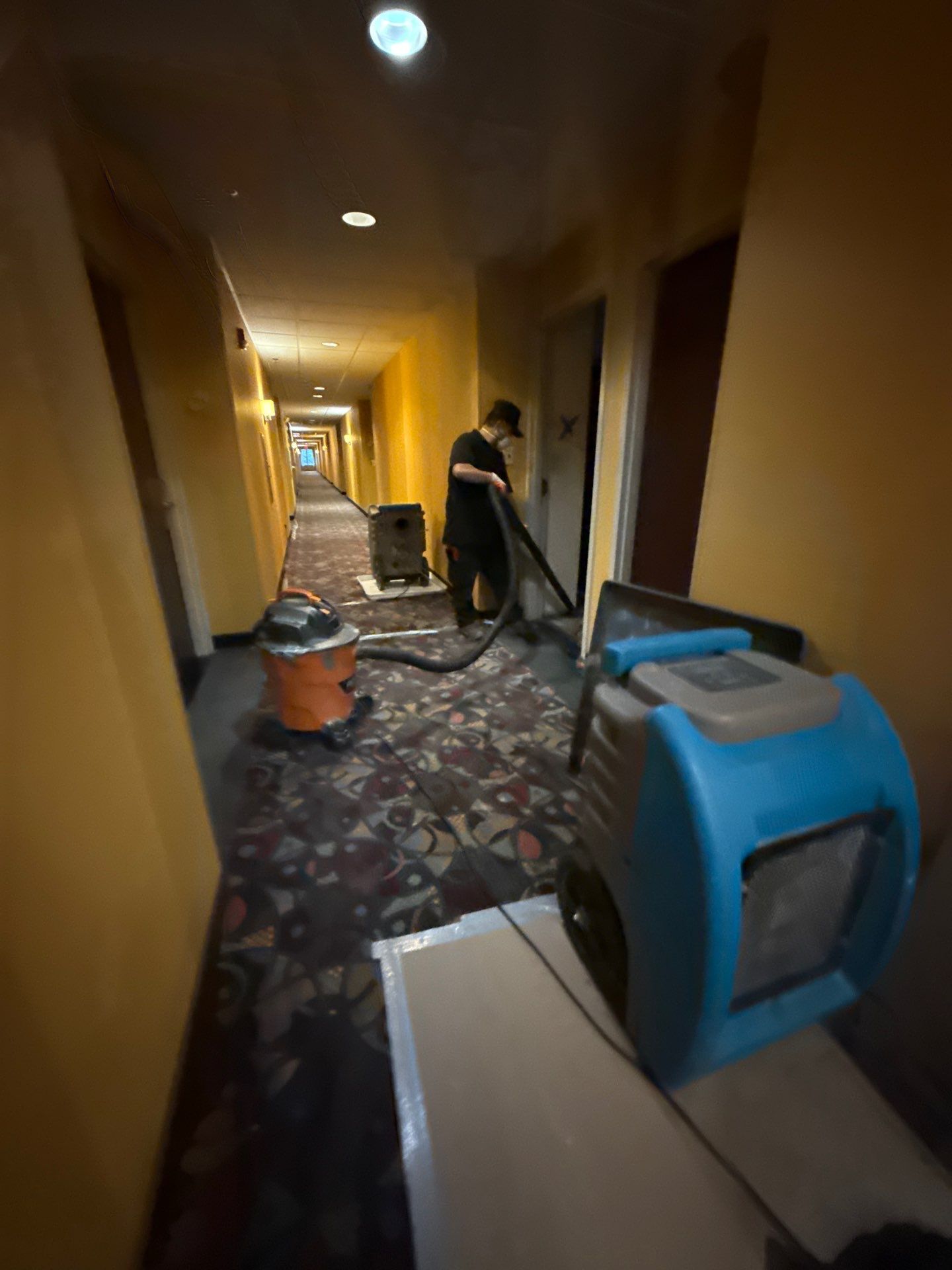 Continued drying setup with equipment deployed across affected areas of Manassas water damage job.