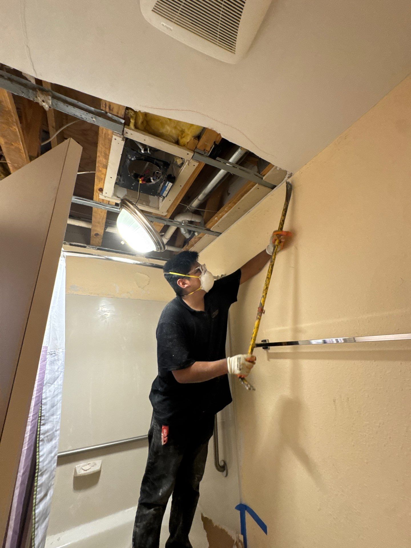 Dehumidifiers and air movers positioned for structural drying phase of water damage restoration in Manassas.