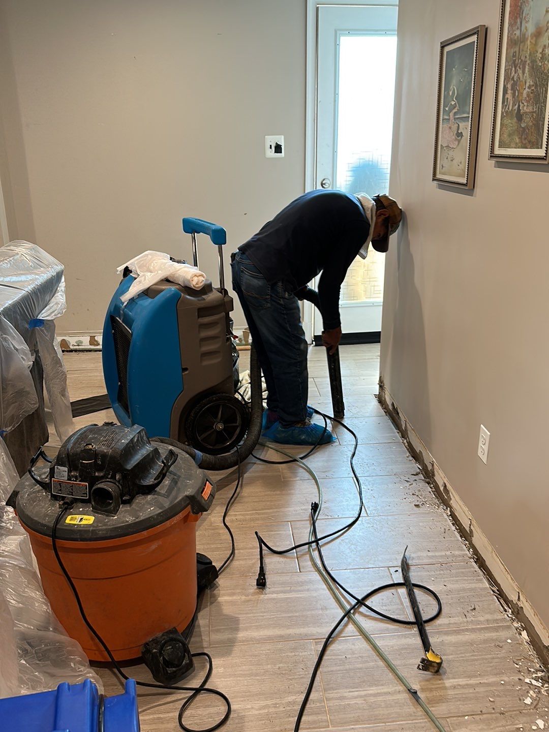 Drying equipment monitoring and extracting residual moisture from structural cavities.