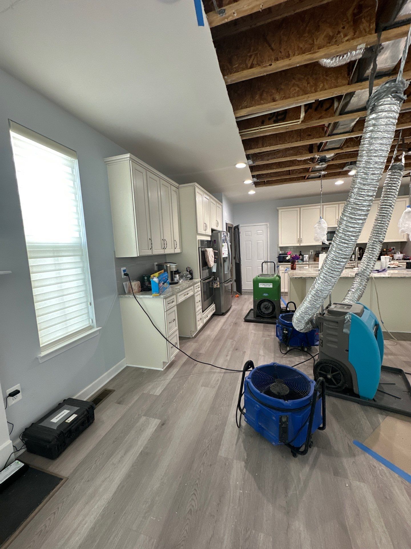 Mid-stage containment and drying verification as mold remediation progresses in Stafford home.