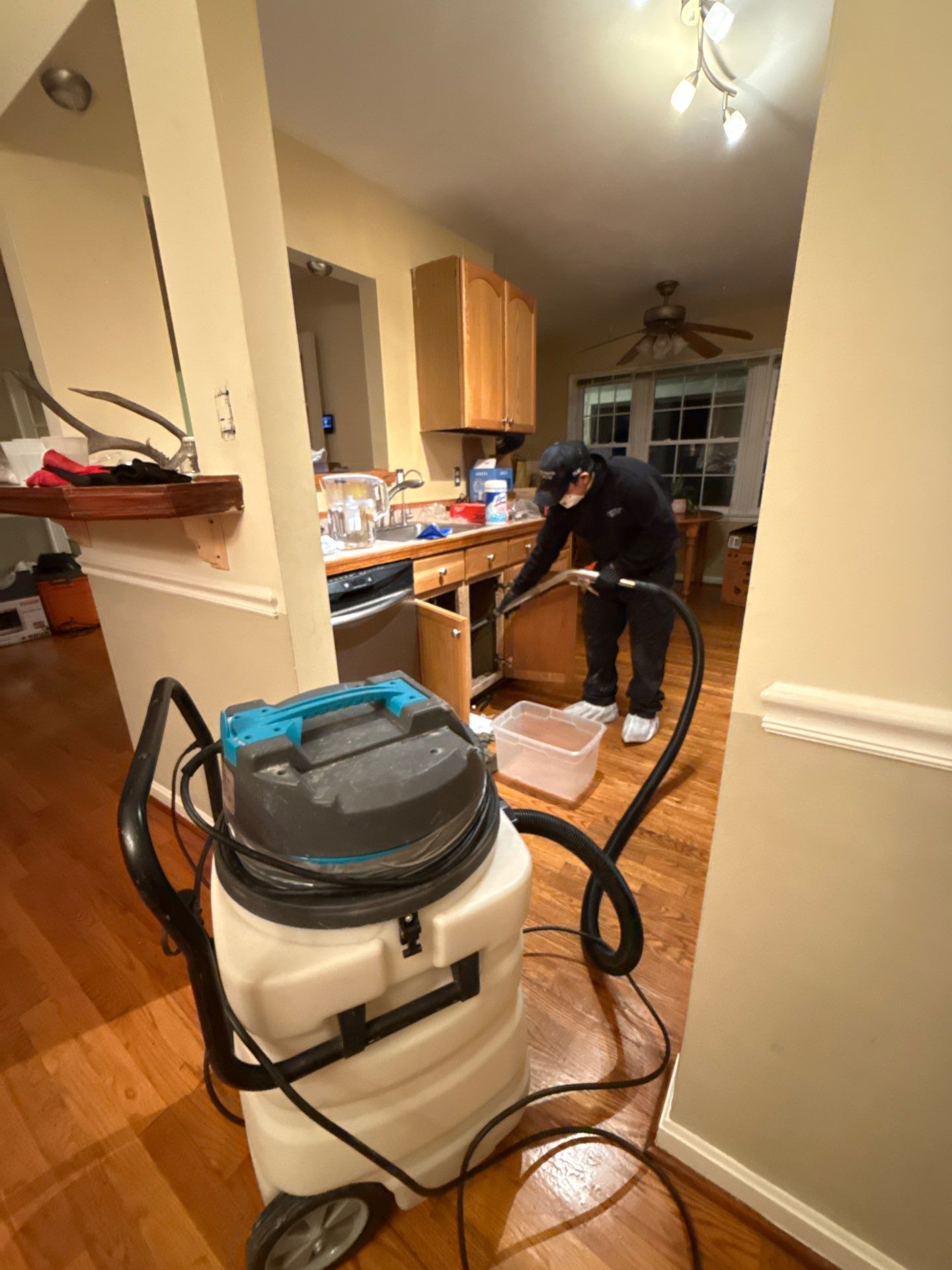 Mid-stage drying operation showing equipment placement and air circulation management in Reston restoration work.