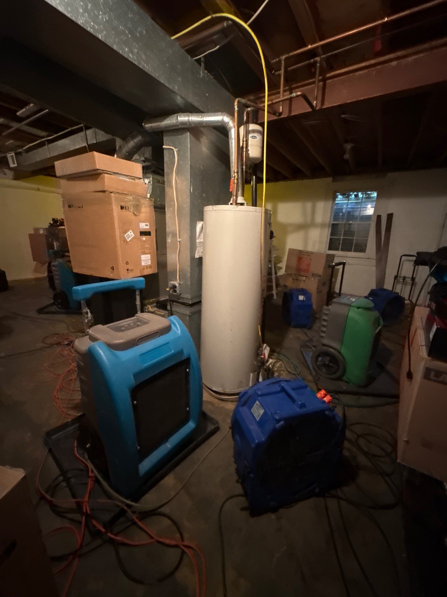Advanced-stage drying configuration showing equipment repositioning for final moisture removal in Vienna.