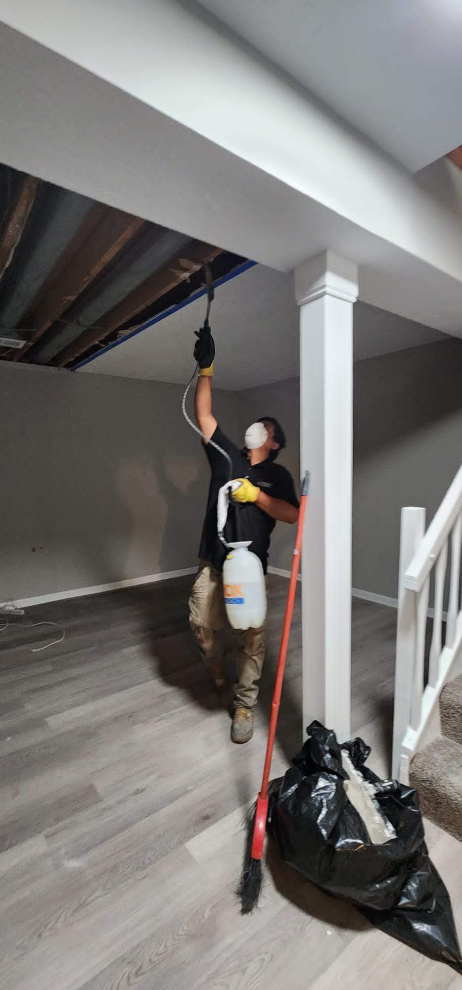 Thermal imaging camera documenting moisture distribution during water damage assessment in Falls Church.