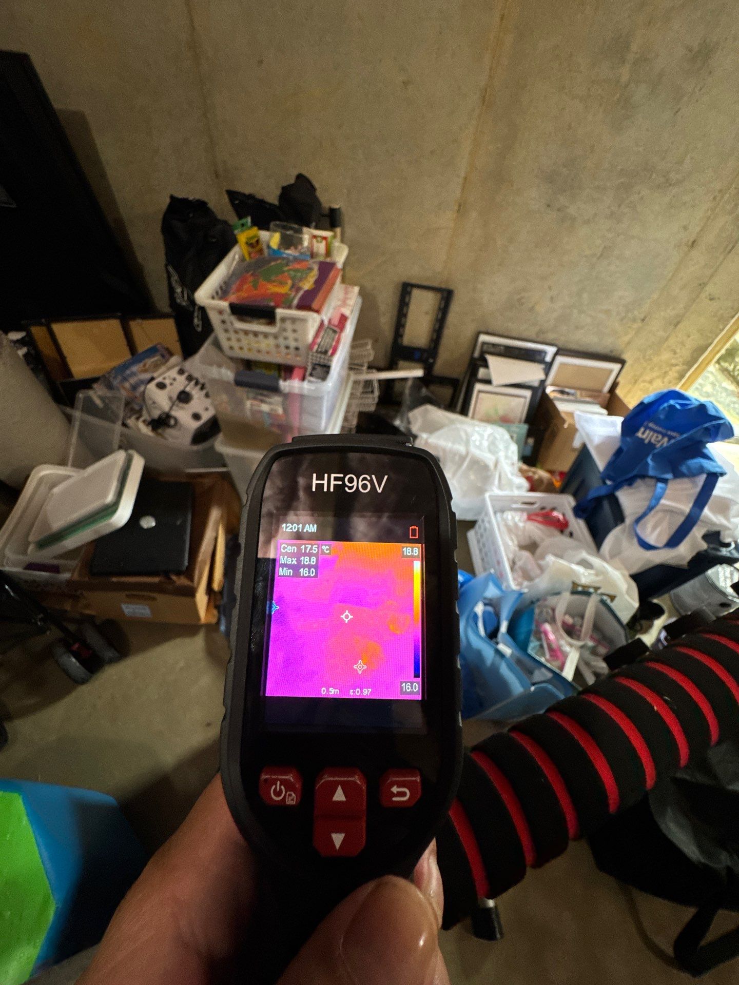 Thermal imaging camera documenting moisture distribution during water damage assessment in Arlington.