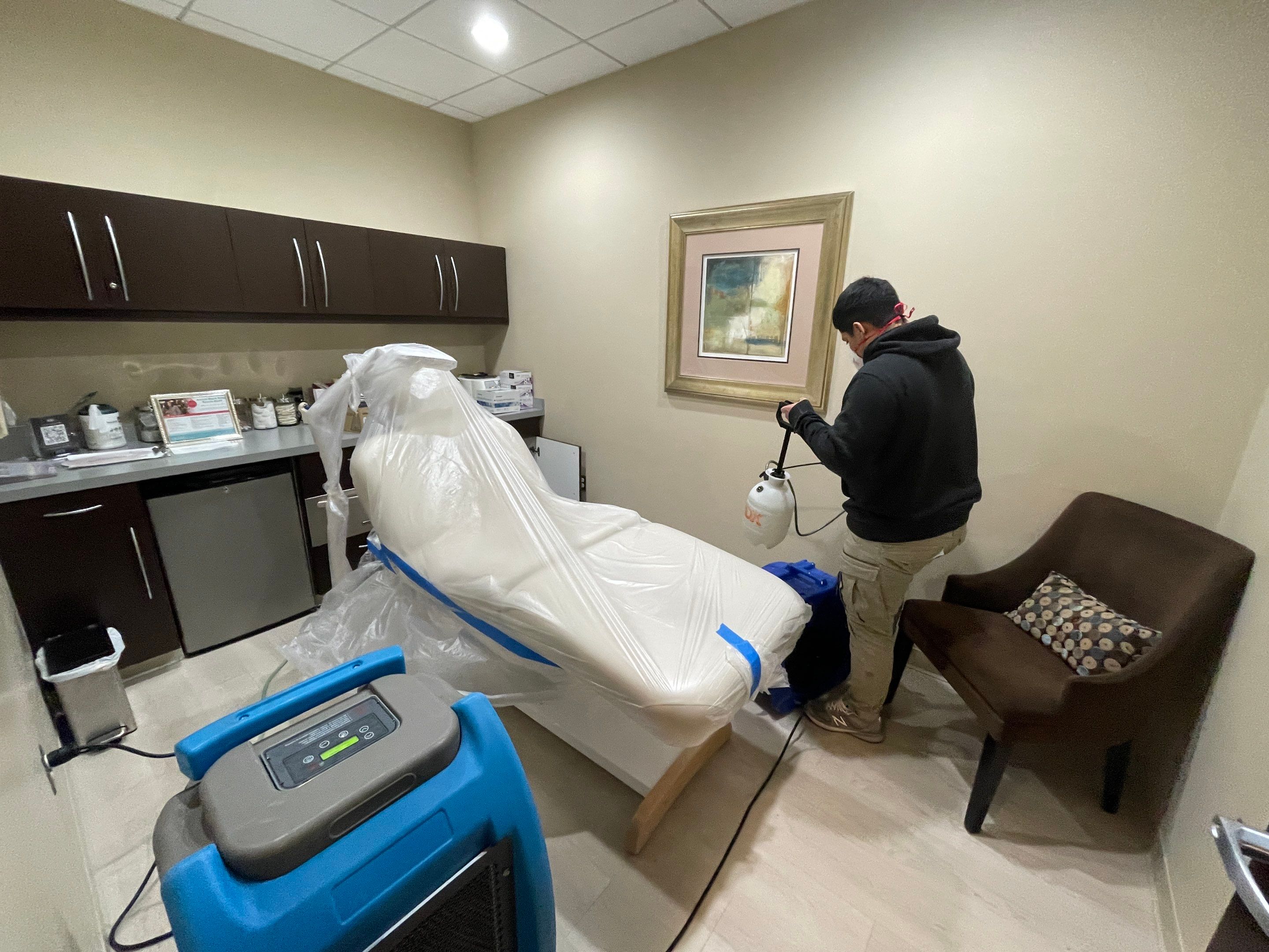 Final moisture verification after water extraction and dehumidification in Leesburg restoration project.