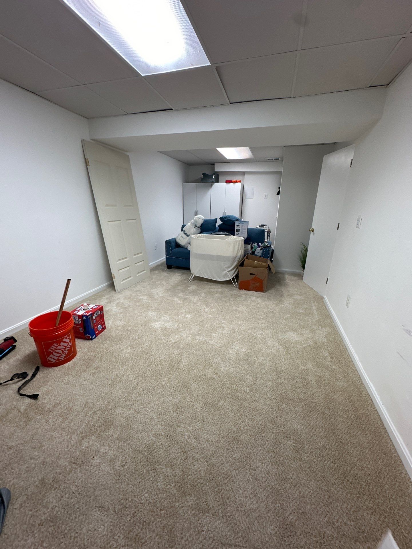Standing water being extracted from flooring during water damage restoration in Herndon.