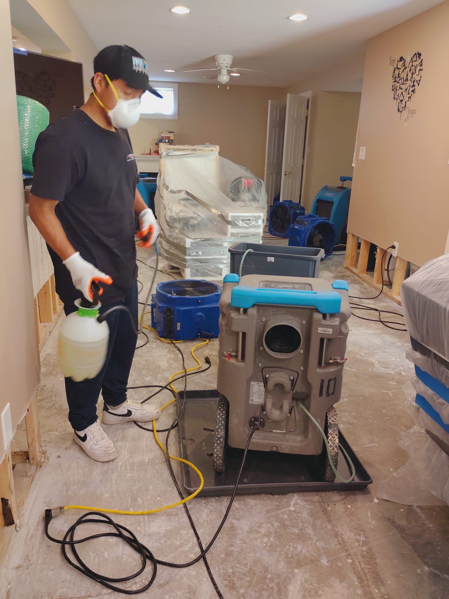 Water damage restoration in Stephens City: structural drying equipment deployed in affected interior space.