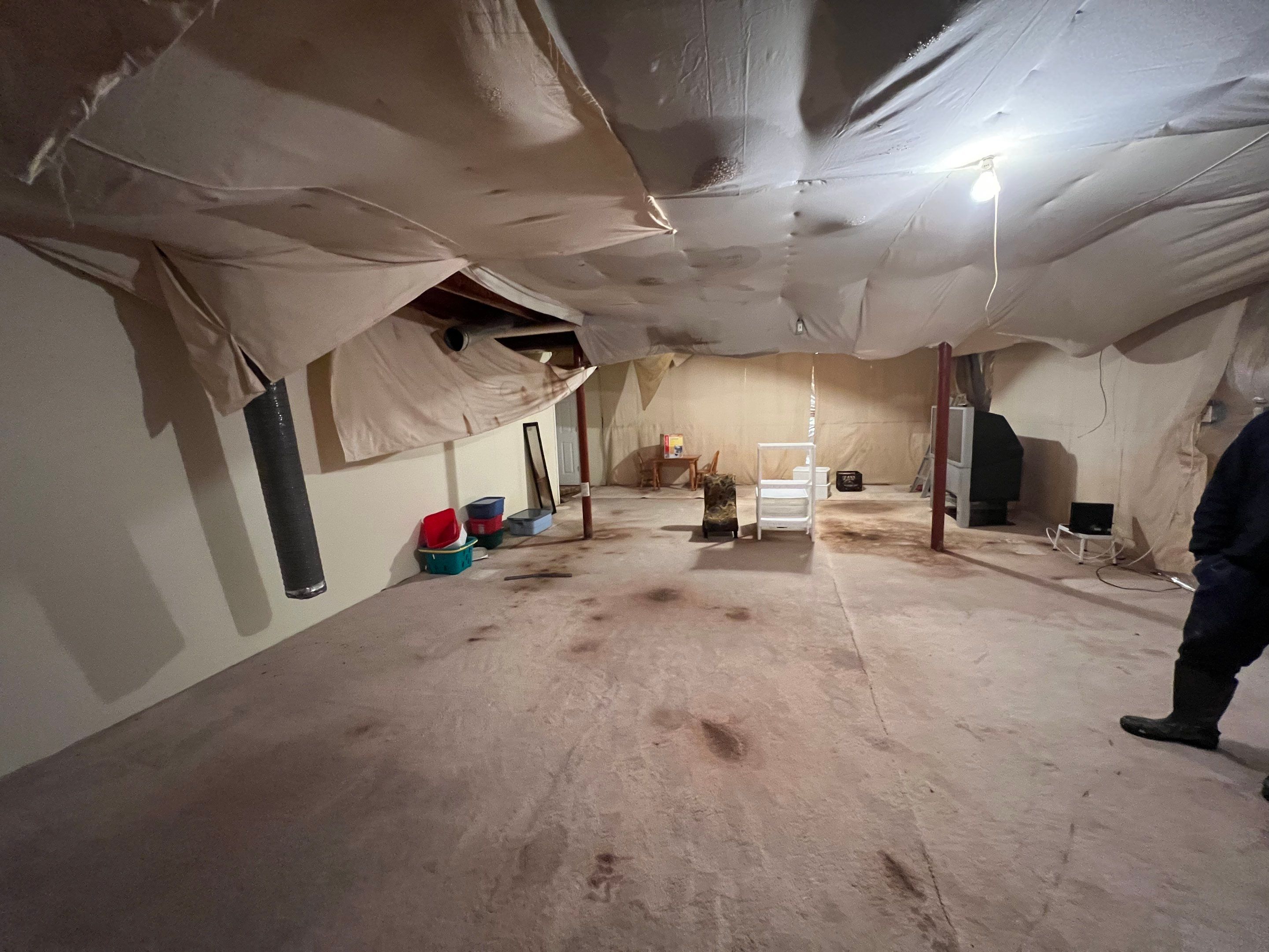 Continued dehumidification and air circulation during water restoration drying phase.