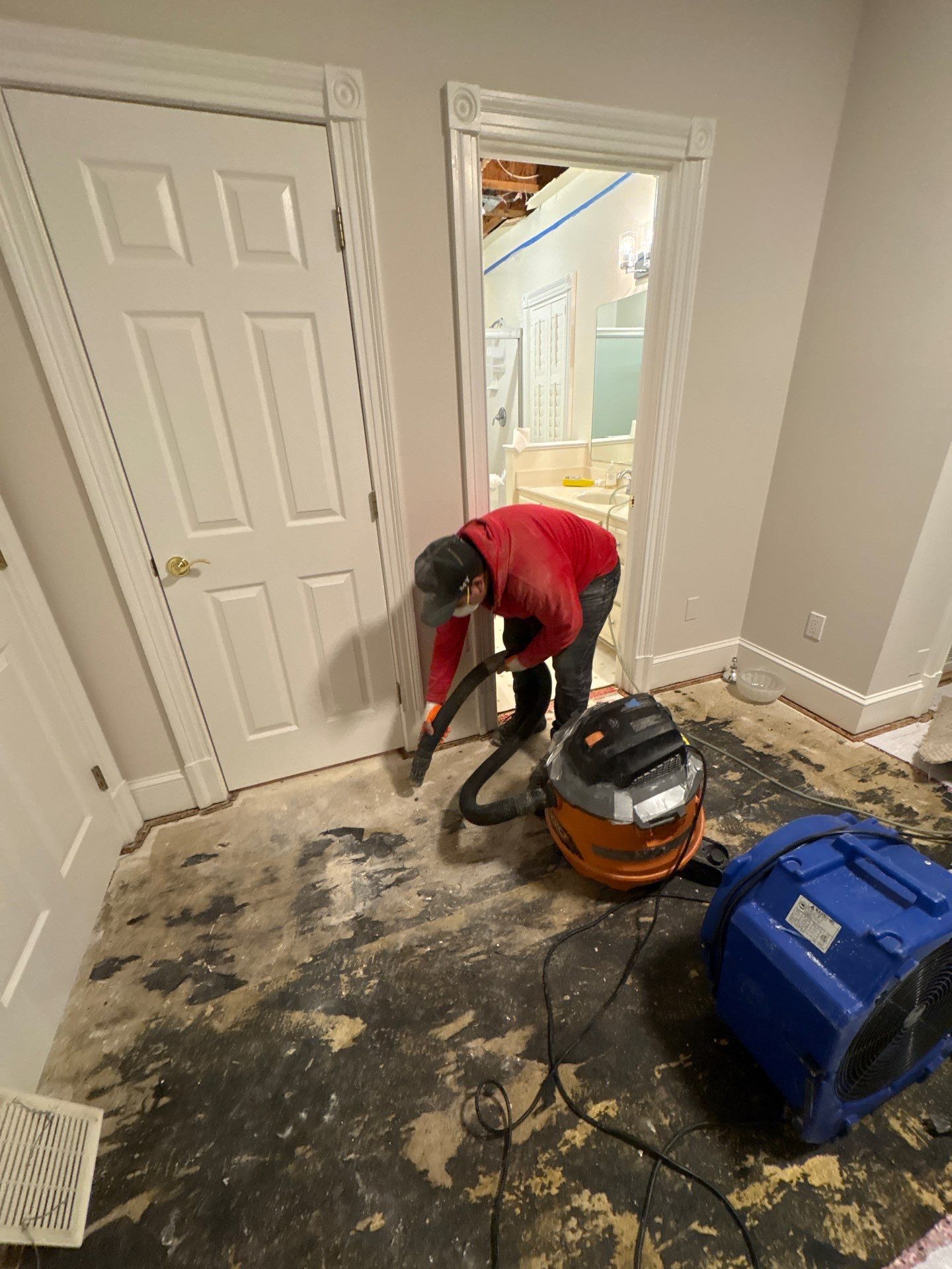 Dehumidification and air movement equipment deployed during structural drying phase of water damage restoration.