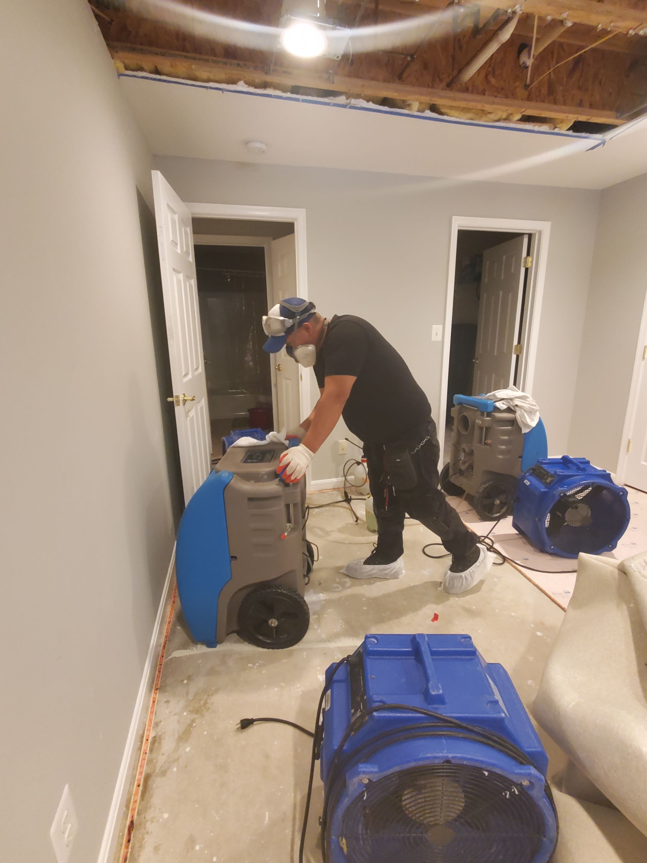 Final-stage water damage restoration in Broadlands showing containment removal and completion of moisture remediation.
