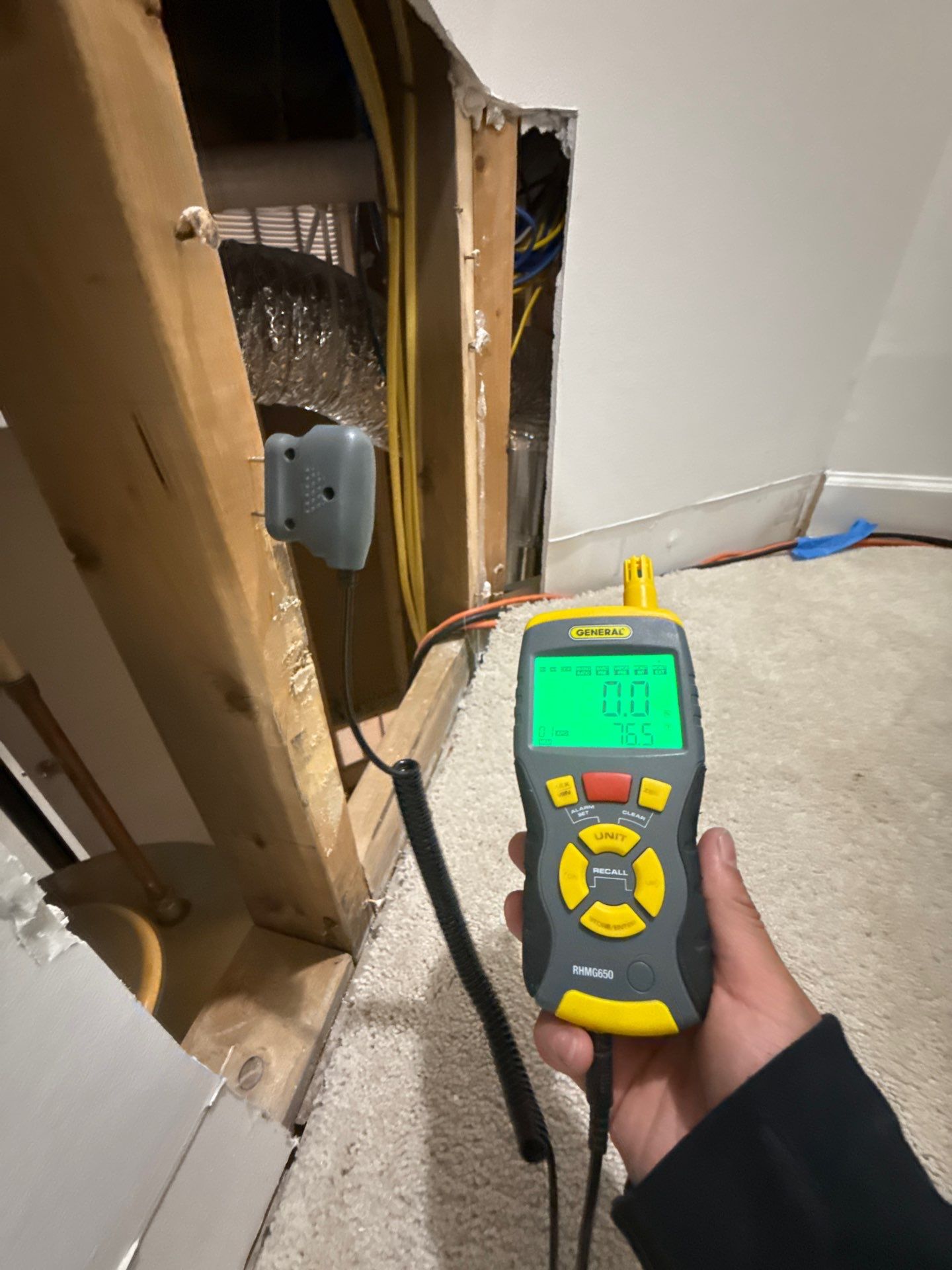 Drying equipment deployed to reduce moisture levels in affected building materials.