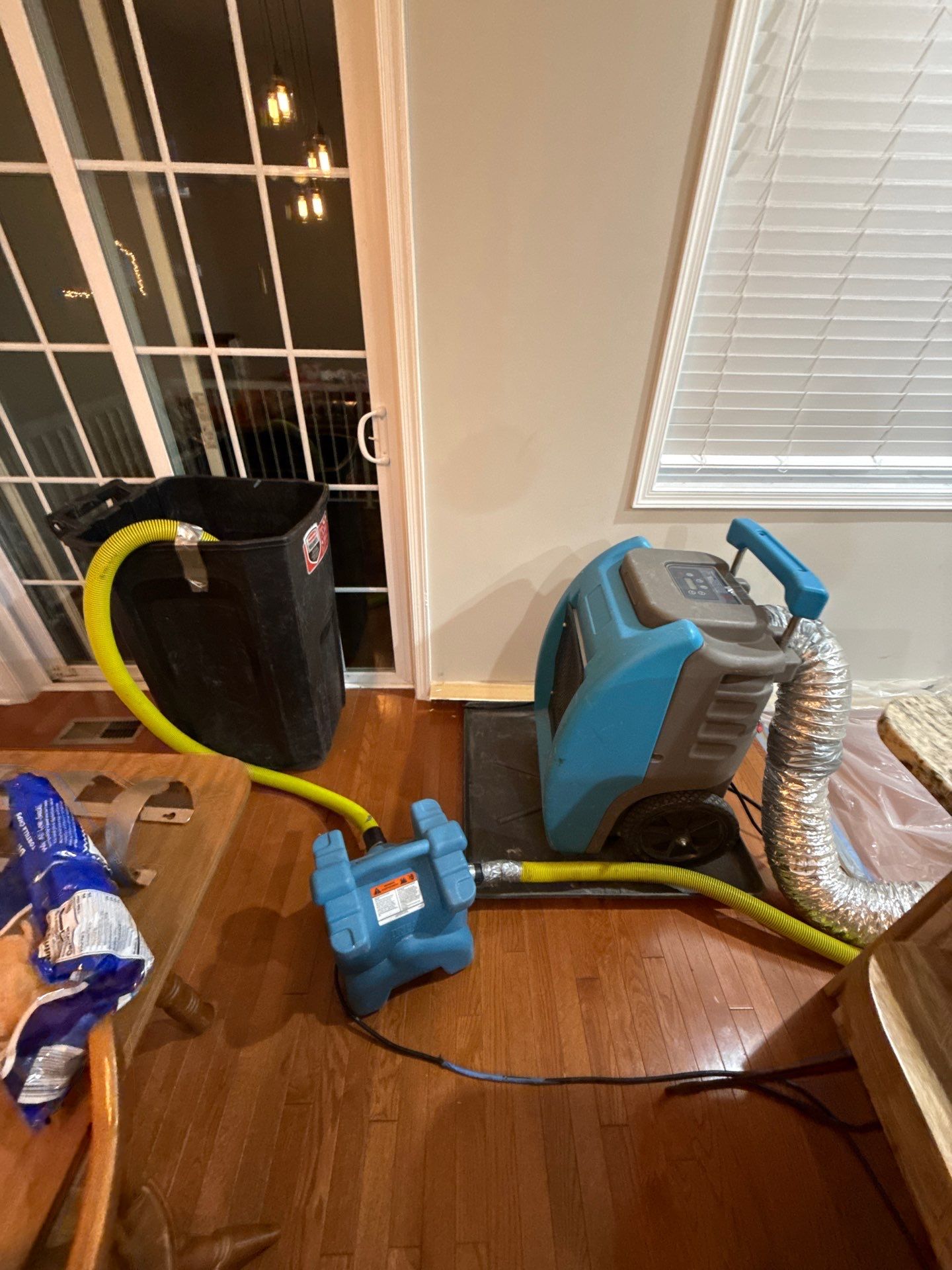 Dehumidification continues as moisture extraction equipment monitors and lowers ambient humidity in the remediation area.