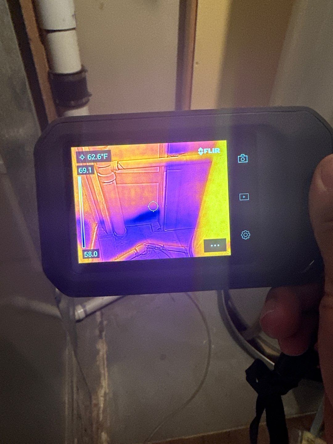 Mid-stage drying setup showing dehumidifiers and air movers working through affected areas during water restoration.
