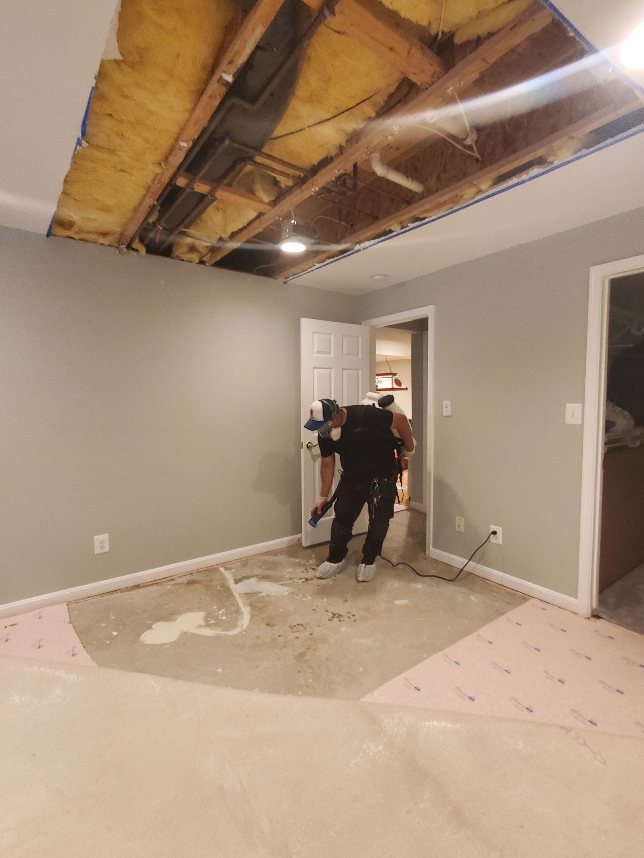 Final dehumidification stage with containment removed, confirming moisture levels normalized post-restoration.