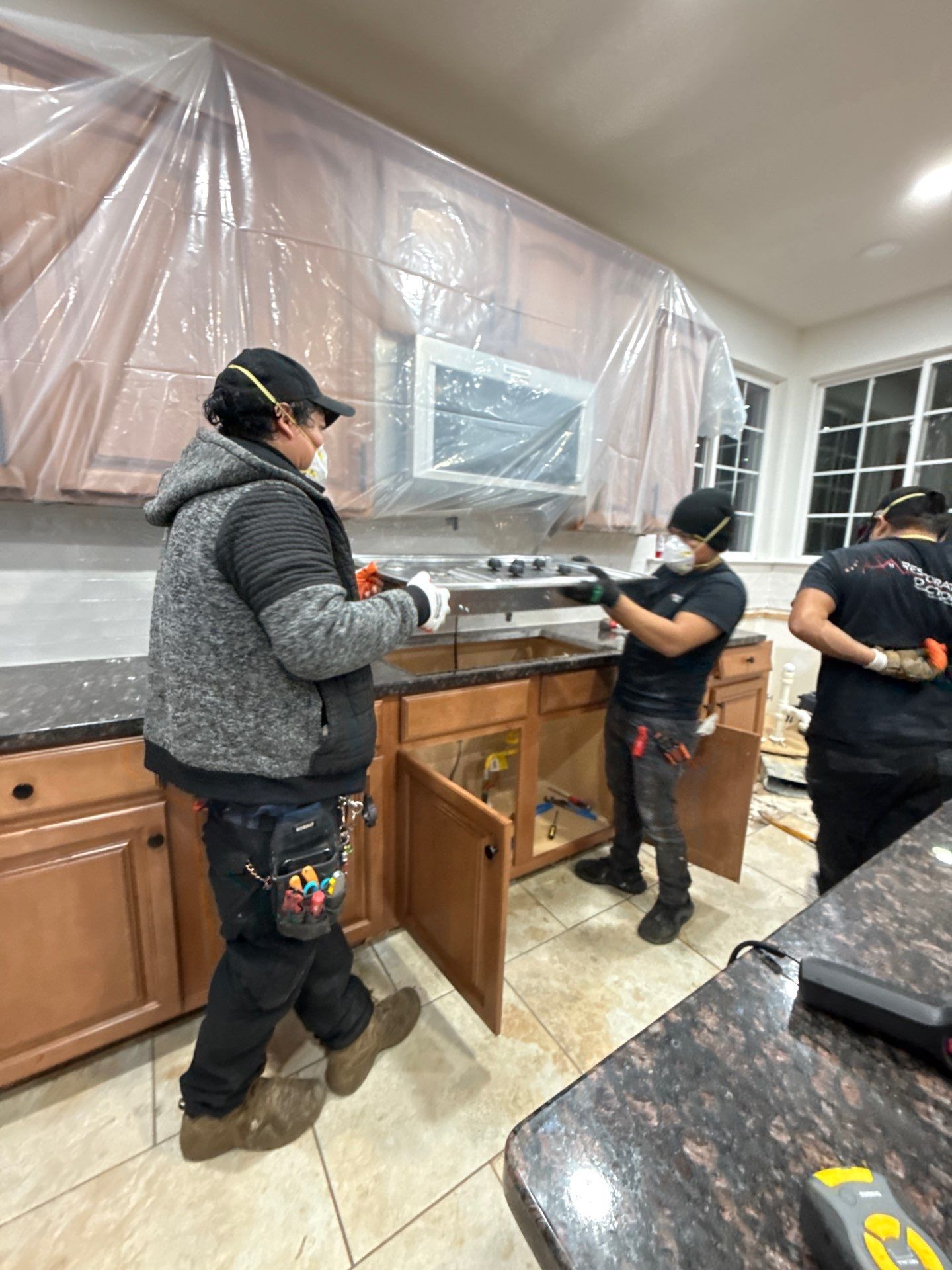 Structural drying continues with air movers positioned to accelerate moisture removal from materials.