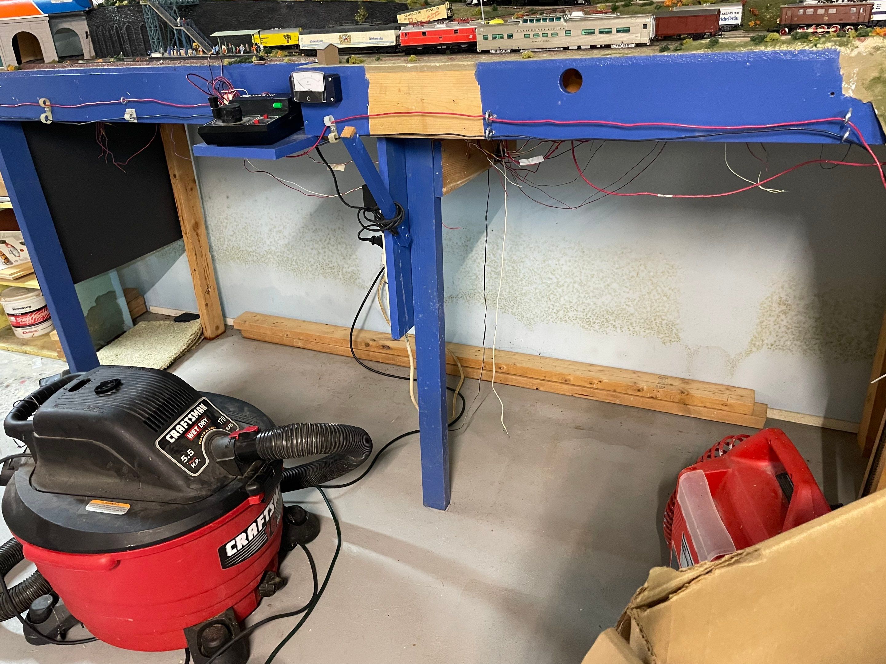 Water extraction equipment in use during mold remediation work in Sterling, removing standing water from affected area.