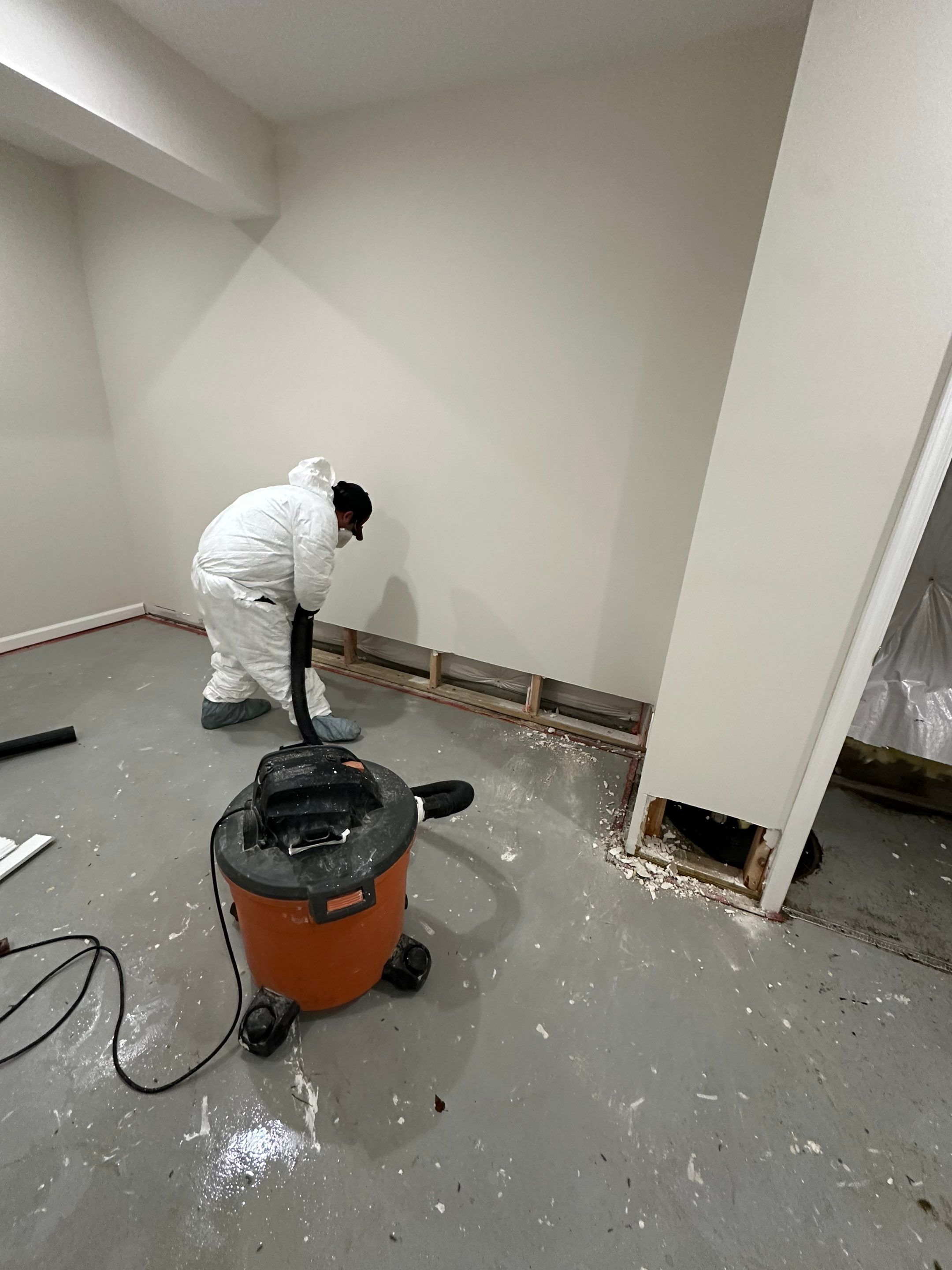 Continued dehumidification and air circulation supporting structural drying of affected wall sections.