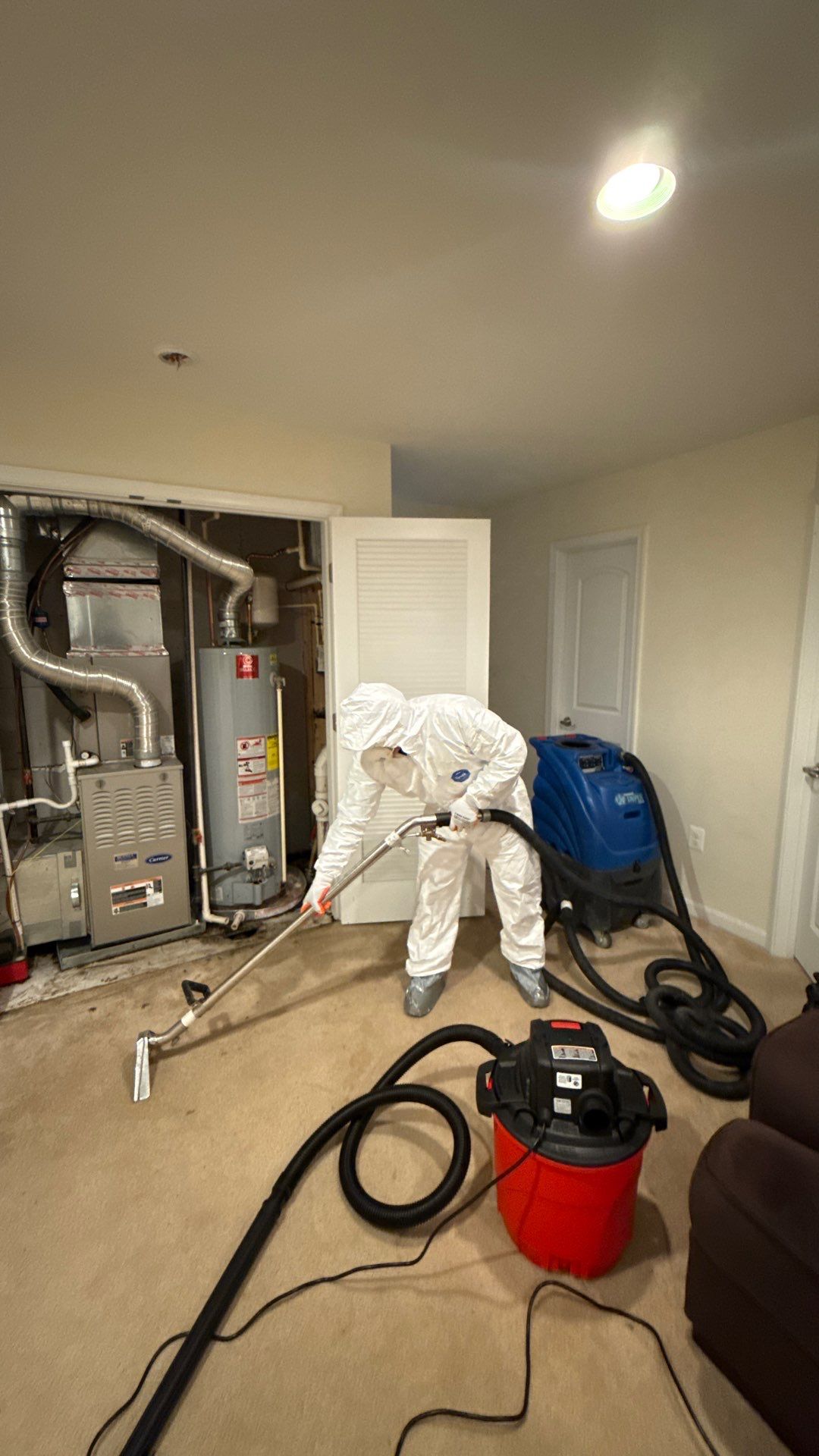 Structural drying equipment positioned within containment during water restoration in Warrenton.