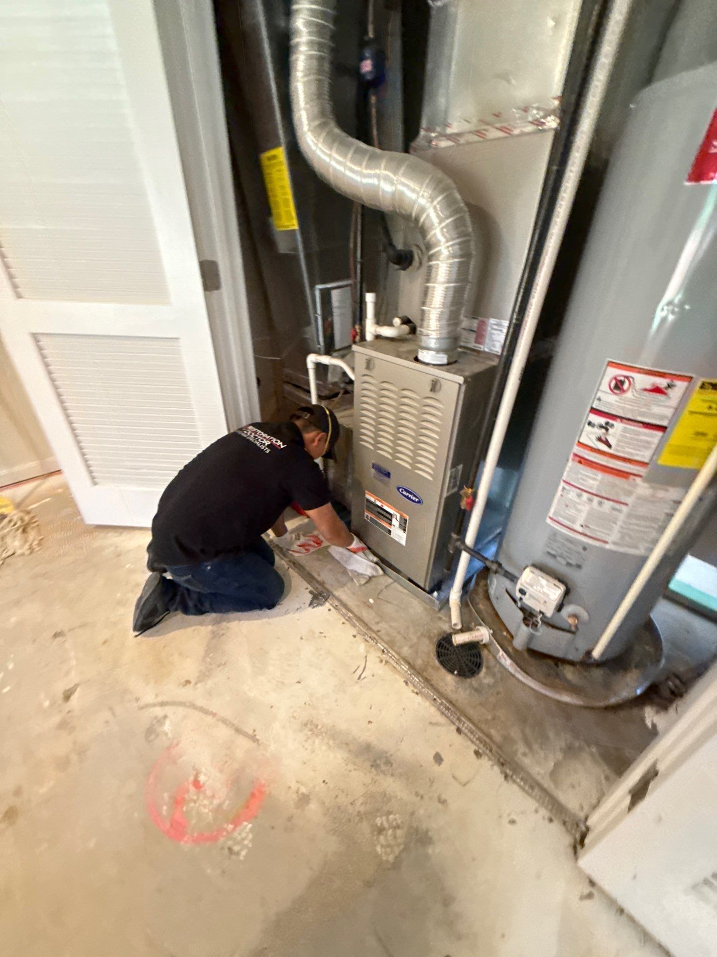 Containment barrier isolating water damage in Warrenton home during initial assessment and setup.