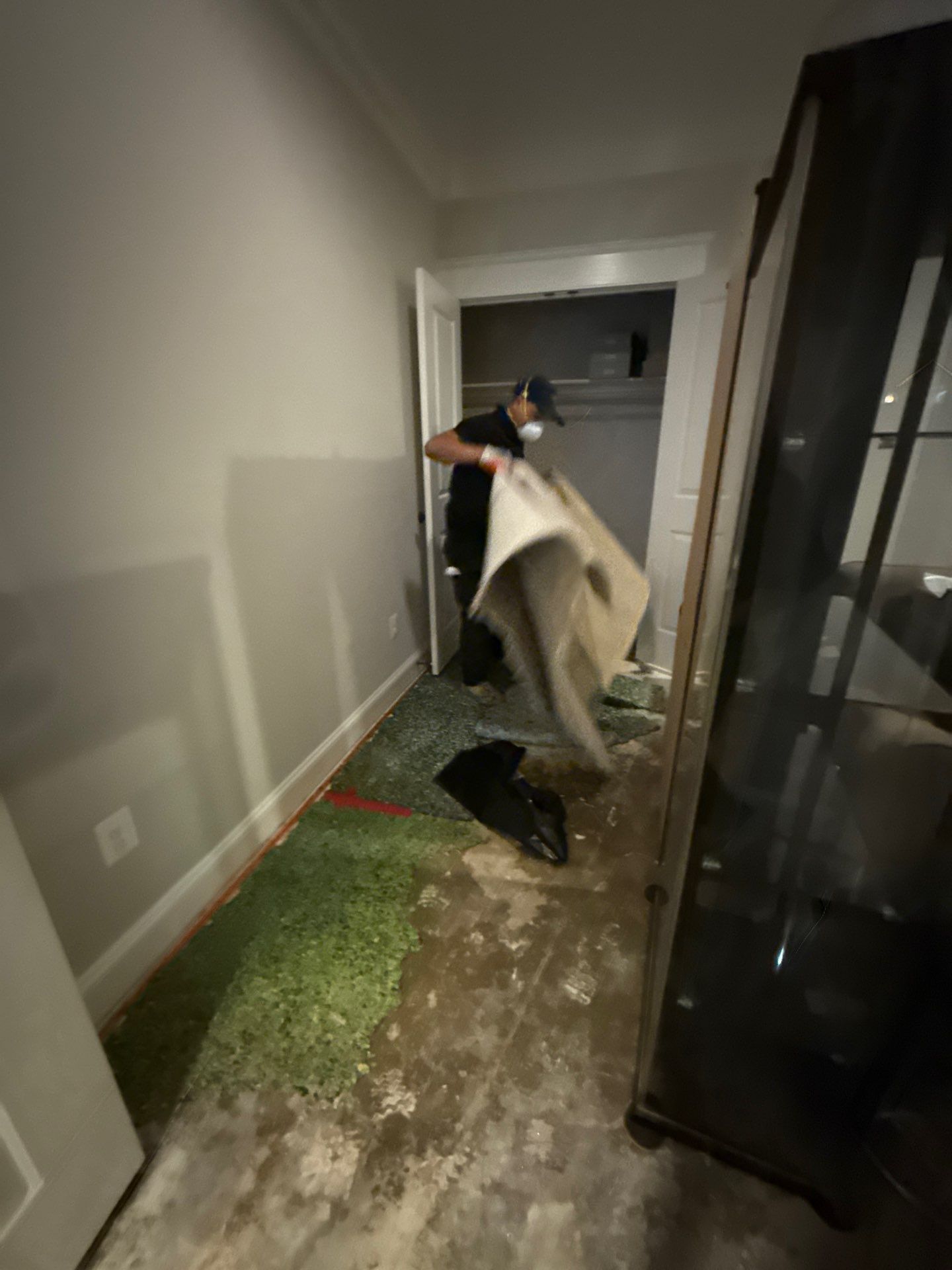 Wall framing exposed after removal of saturated materials in Church home.