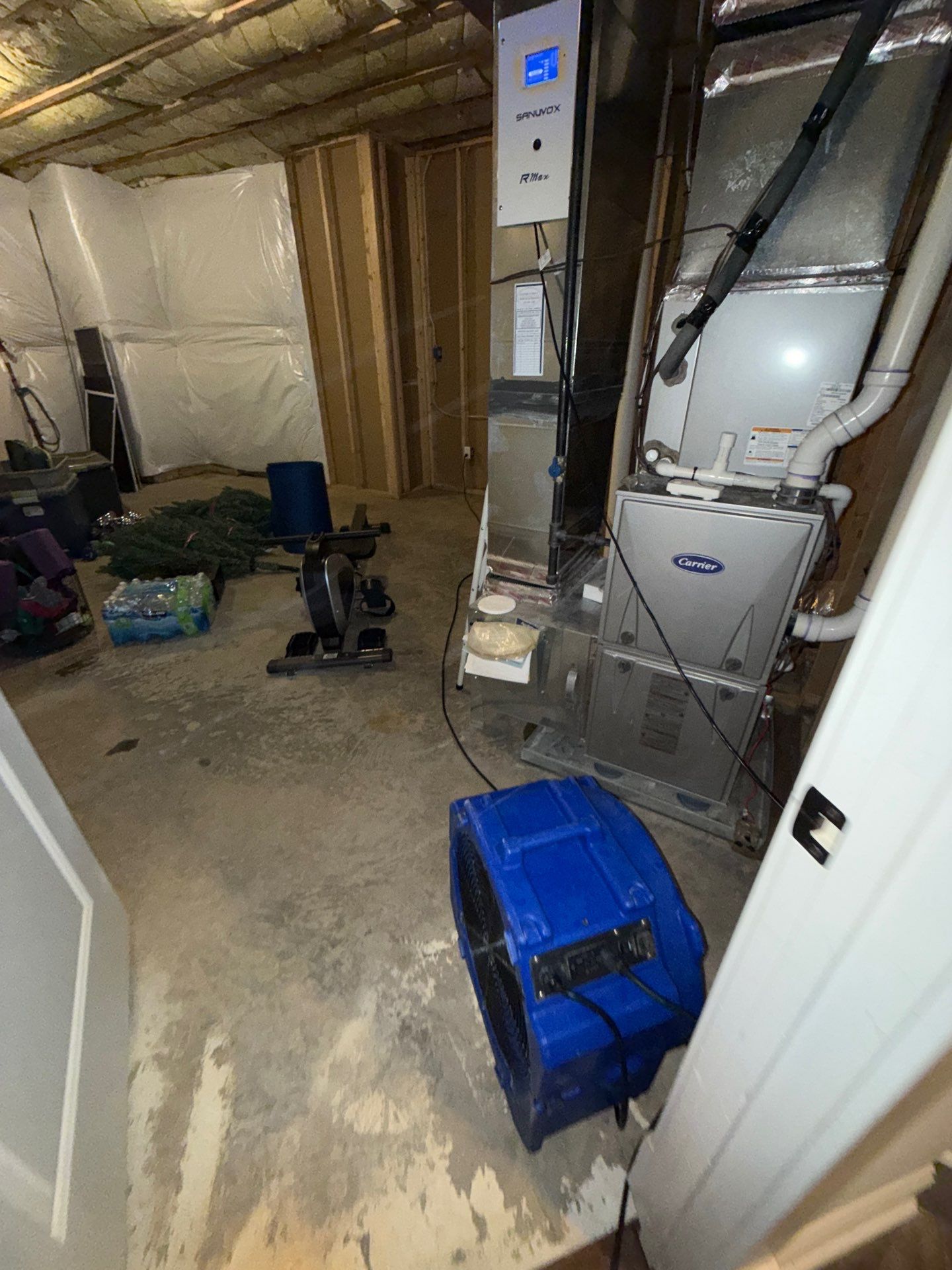 Standing water being extracted from Church home during water damage restoration.