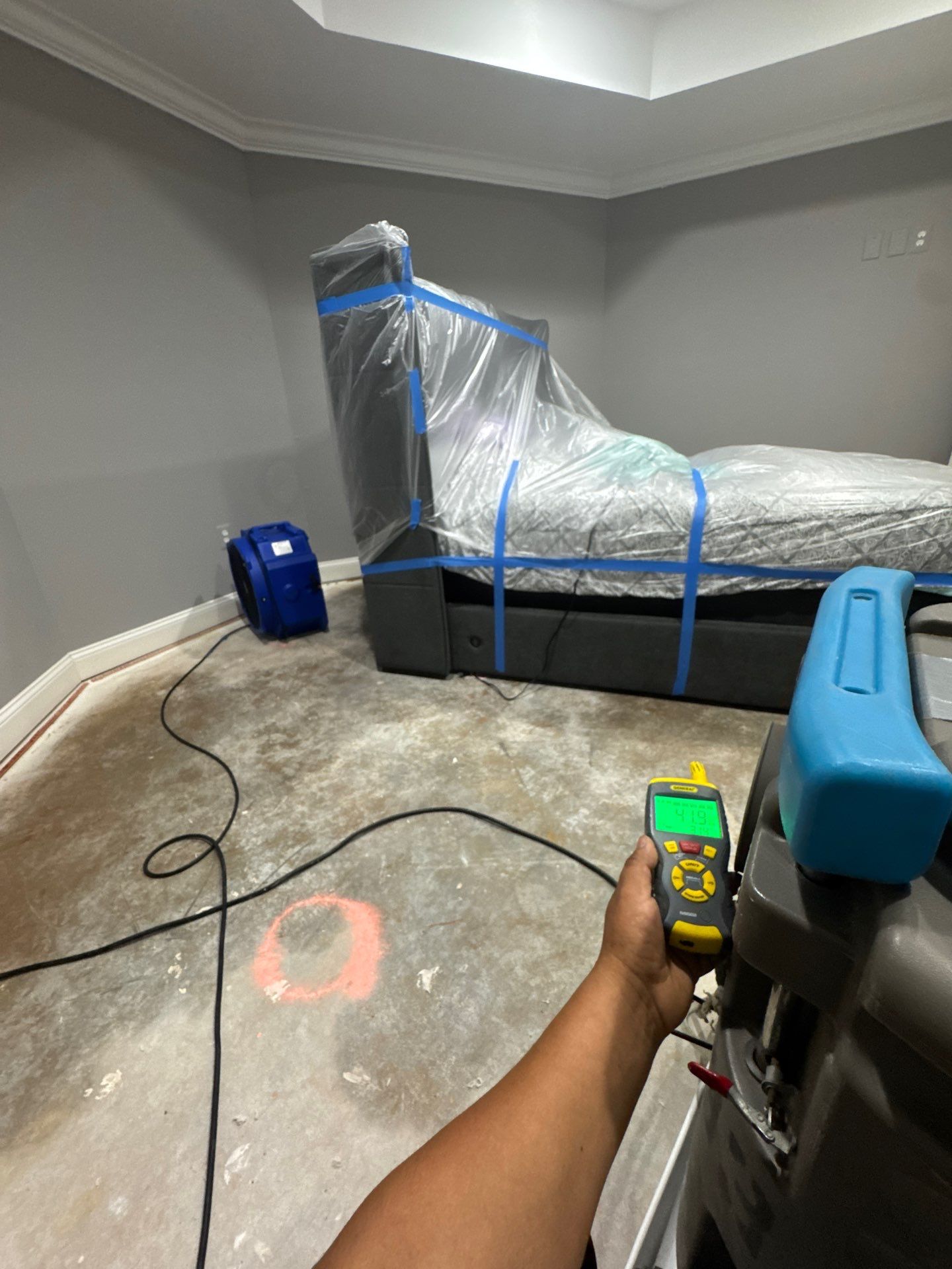 Final-stage water damage restoration in Woodbridge, drying phase nearing completion.