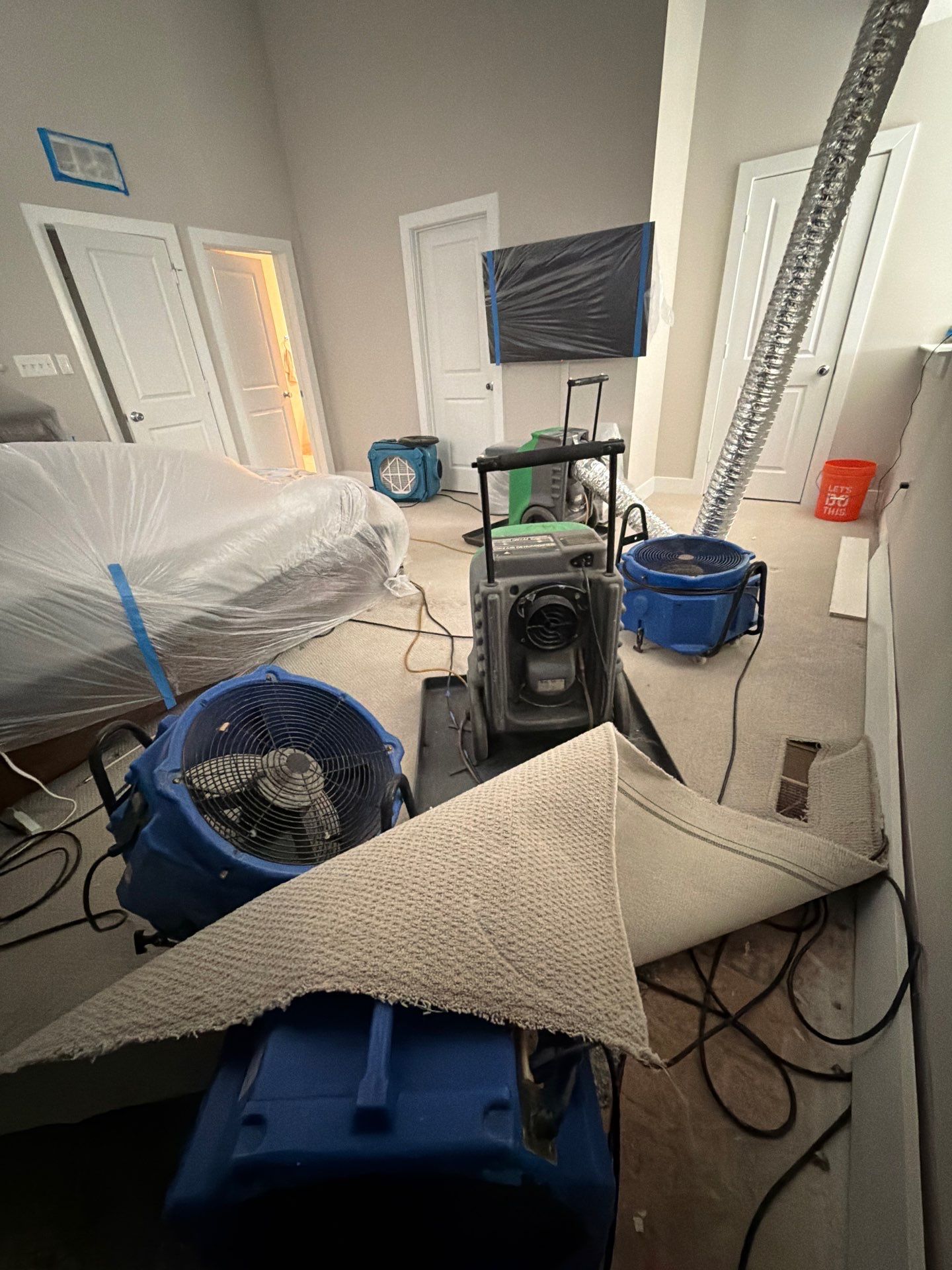 Final drying stages of mold remediation, preparing surfaces for ceiling repair and restoration.