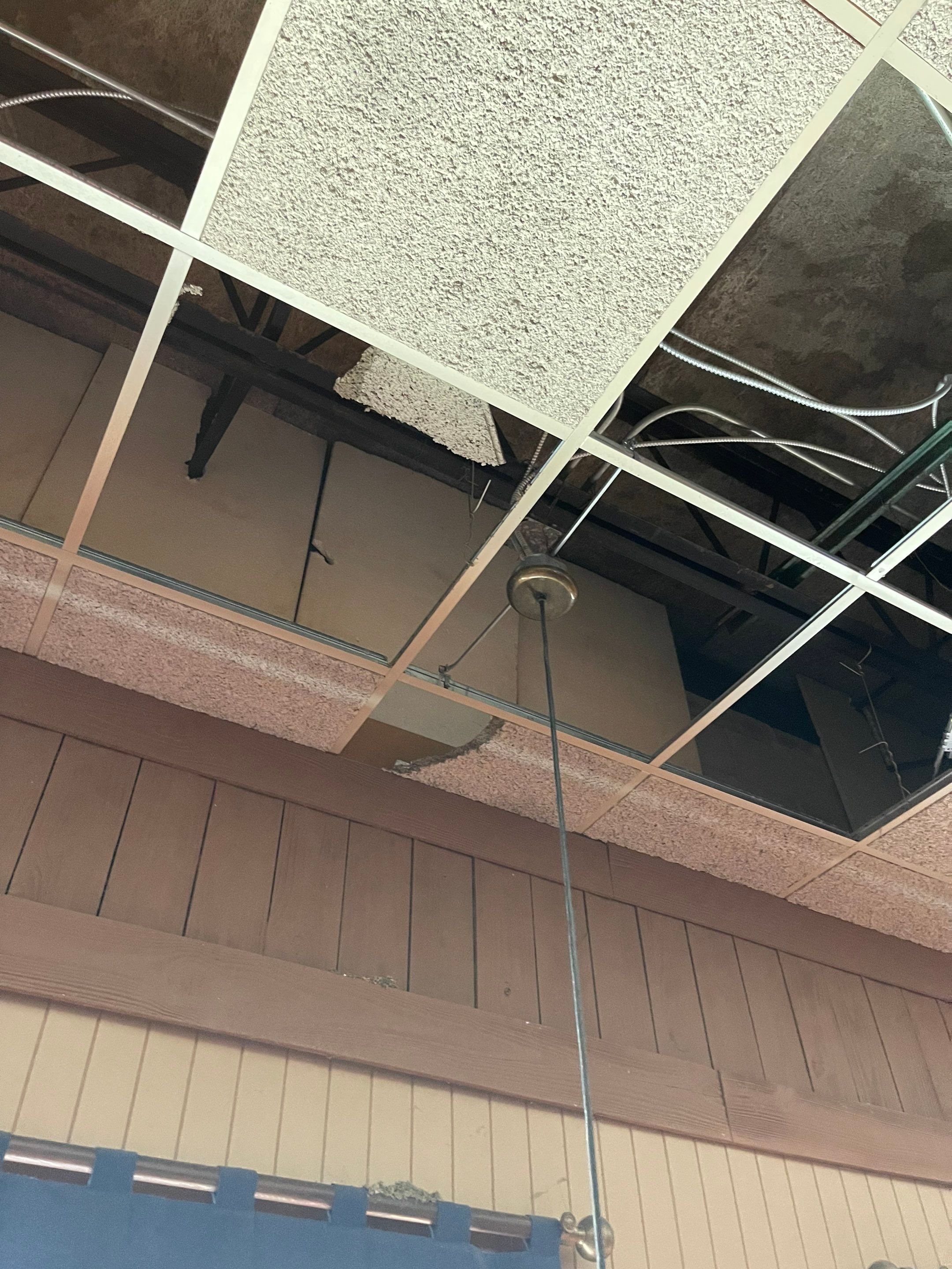 Dehumidification equipment positioned to manage moisture during water damage restoration in Alexandria.