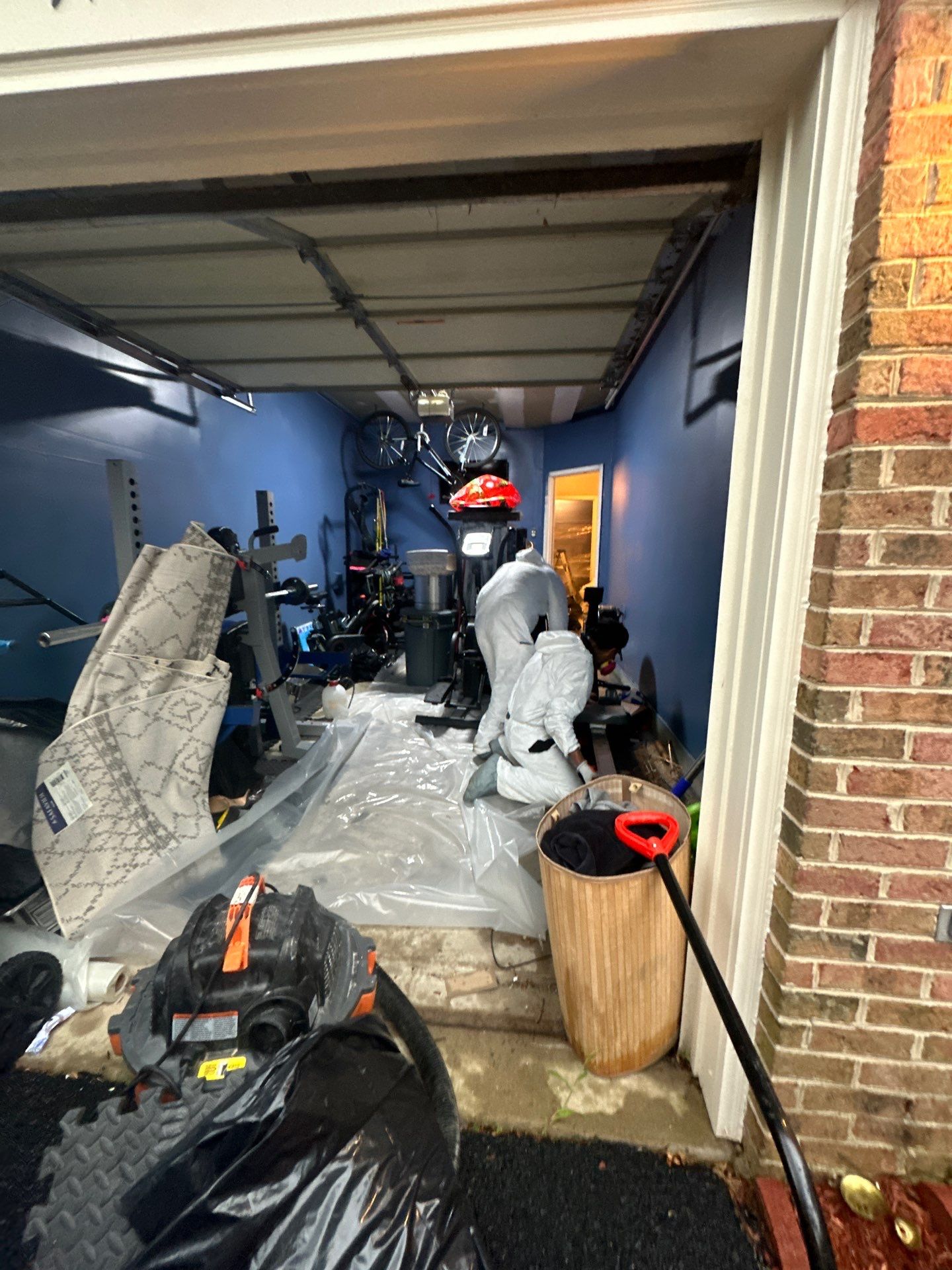 Mid-stage drying progress showing reduced moisture readings on thermal inspection during active water damage restoration.