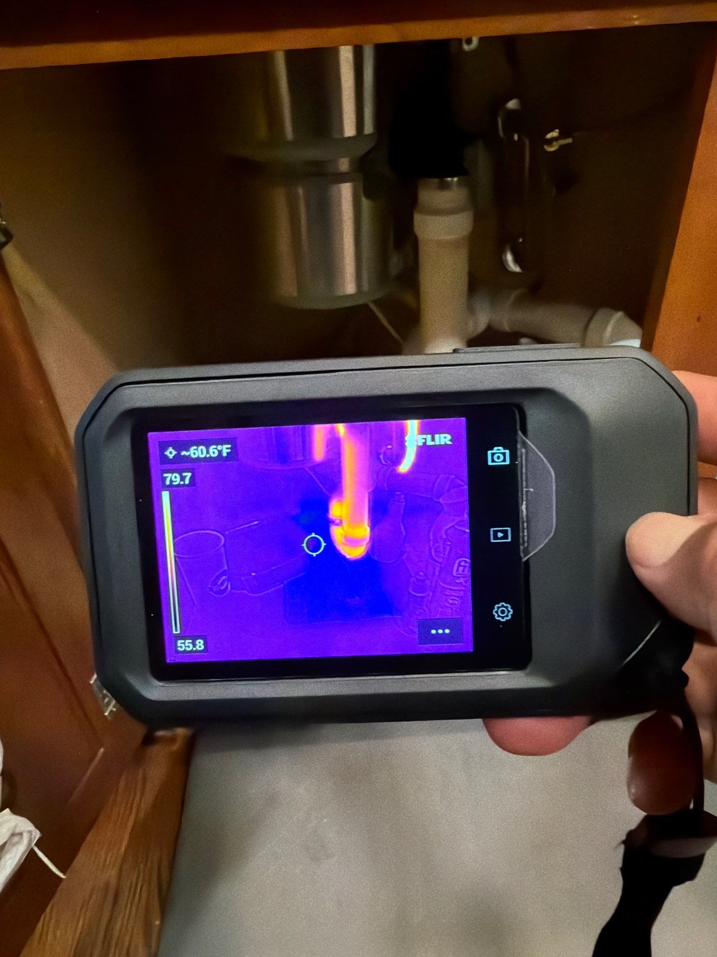 Moisture monitoring and continued drying operations within sealed containment barrier during mid-restoration phase.