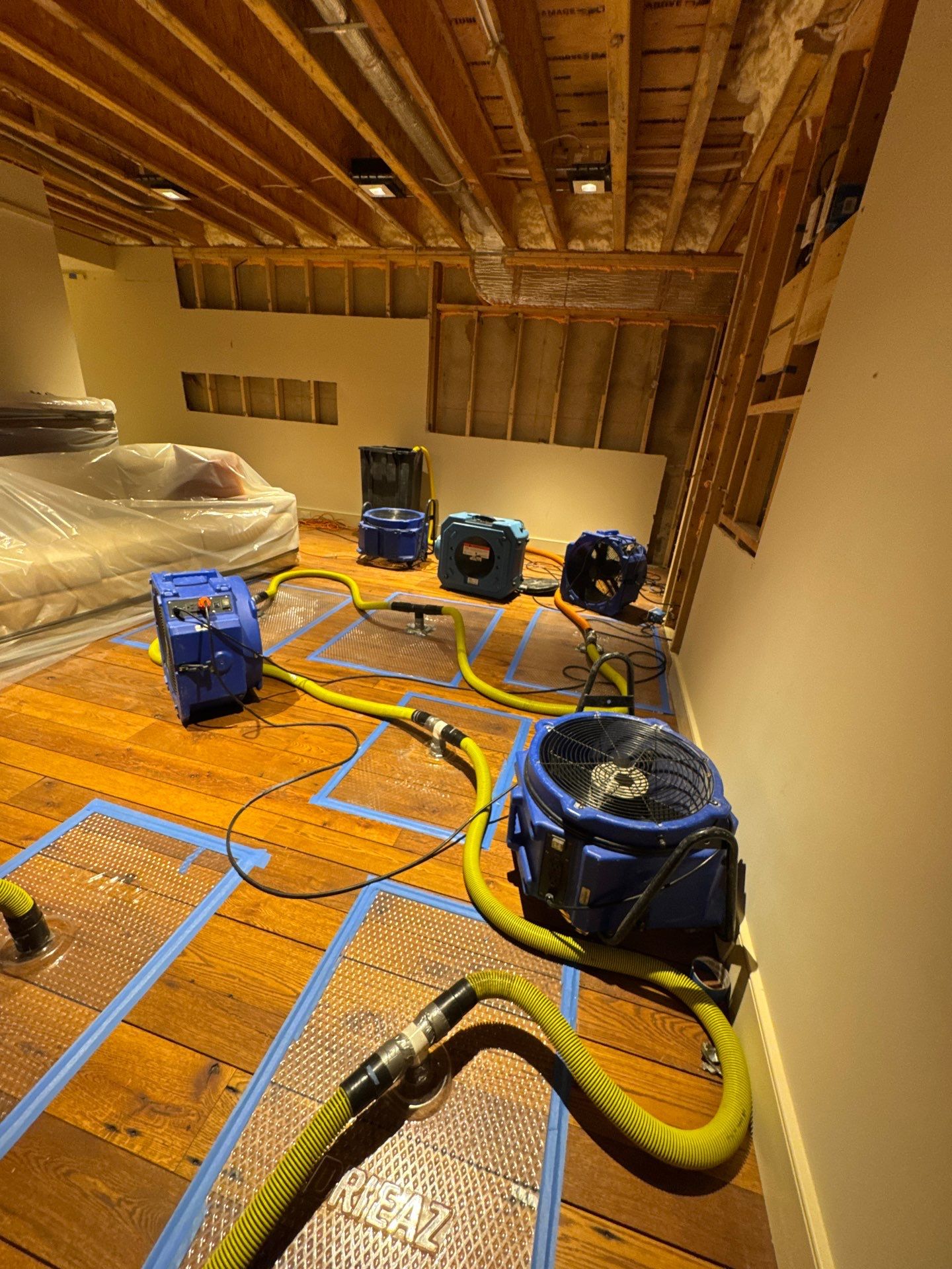 New framing and substrate installation during restoration phase.