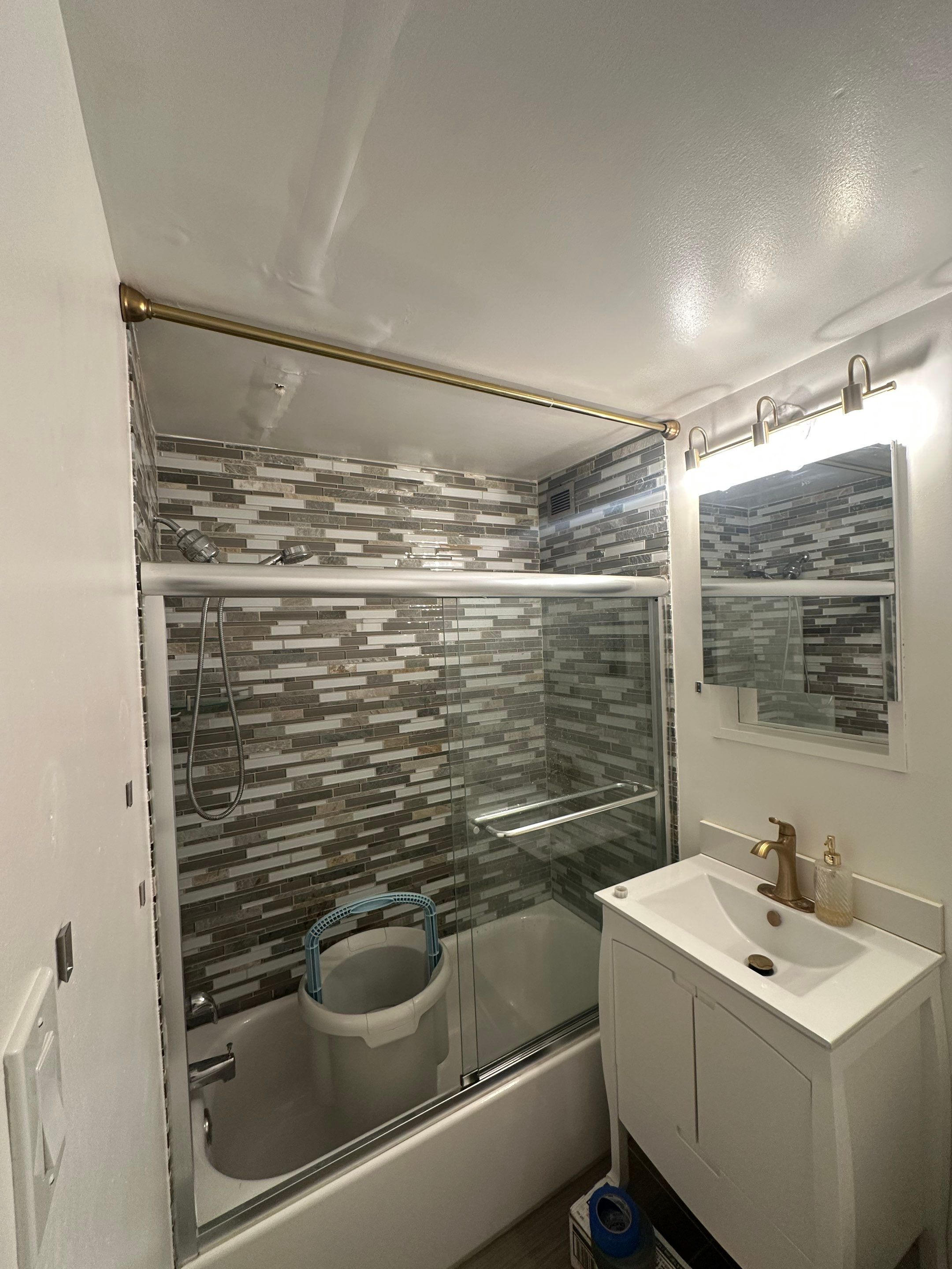 Repaired ceiling drywall installed and finished, water damage restoration complete in Arlington.