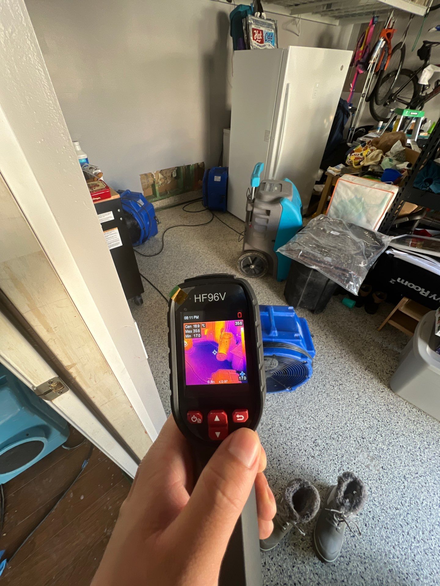 Thermal imaging camera capturing moisture distribution during water damage assessment in Aldie.