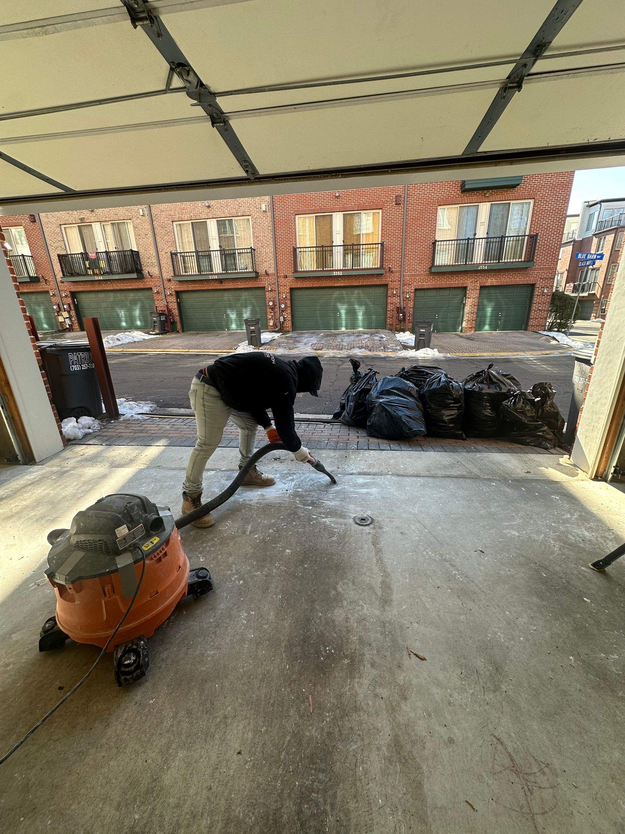 Ceiling section removed during water damage restoration, exposing framing and moisture-affected materials in Fairfax.