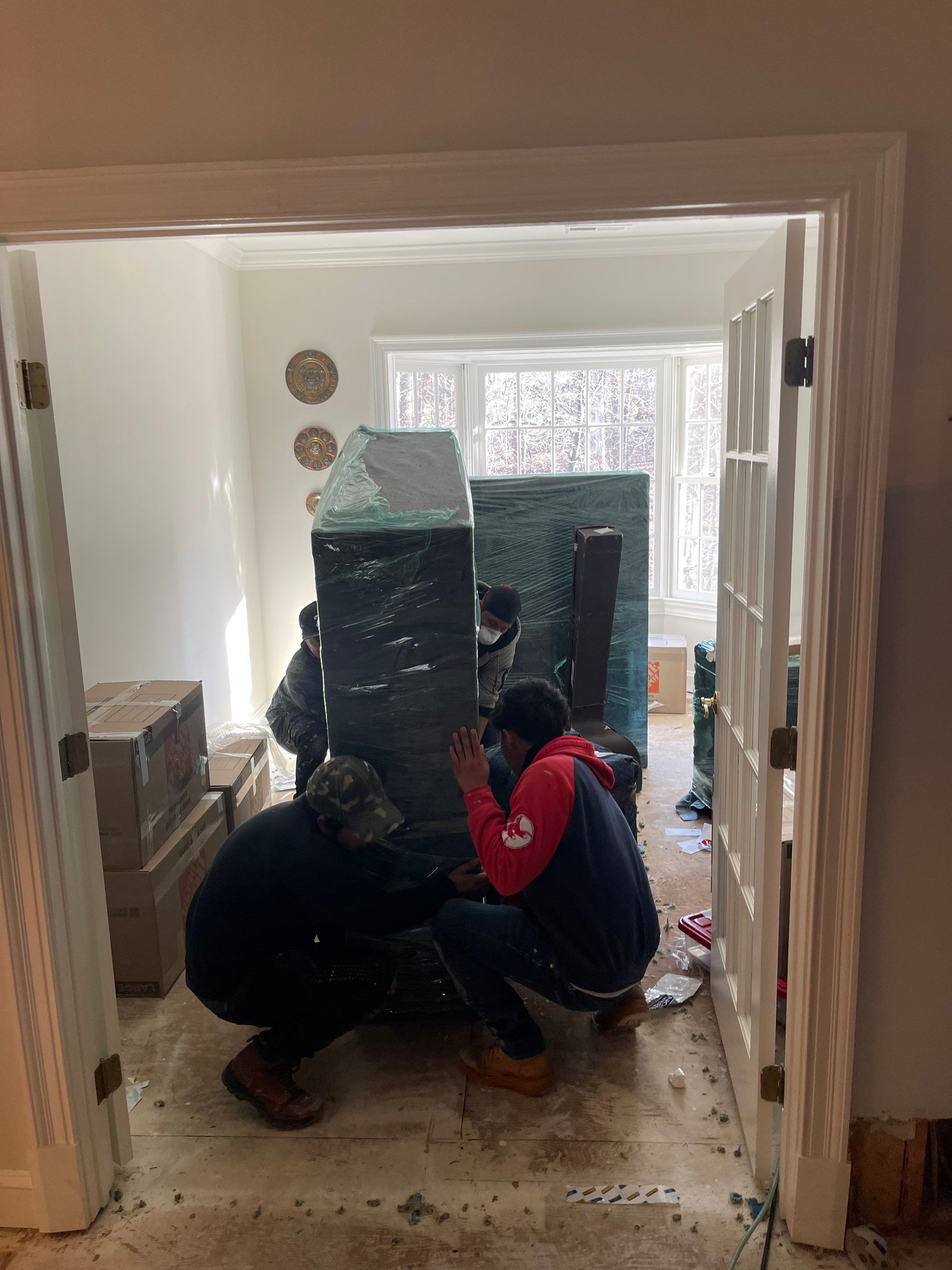 Ceiling damage visible; drying equipment continues moisture extraction as part of water restoration process.