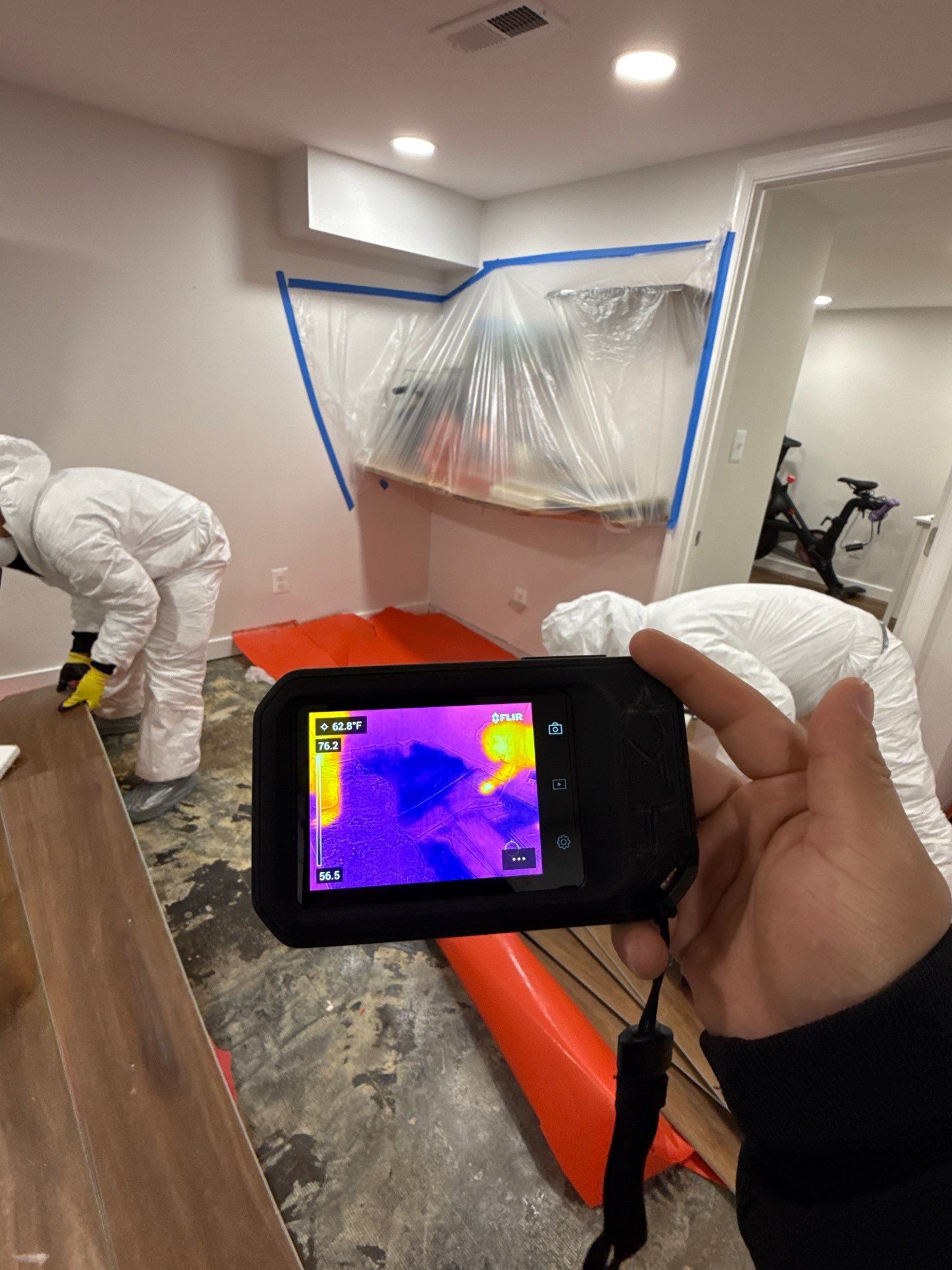 Moisture monitoring and equipment placement during Alexandria water restoration drying cycle.