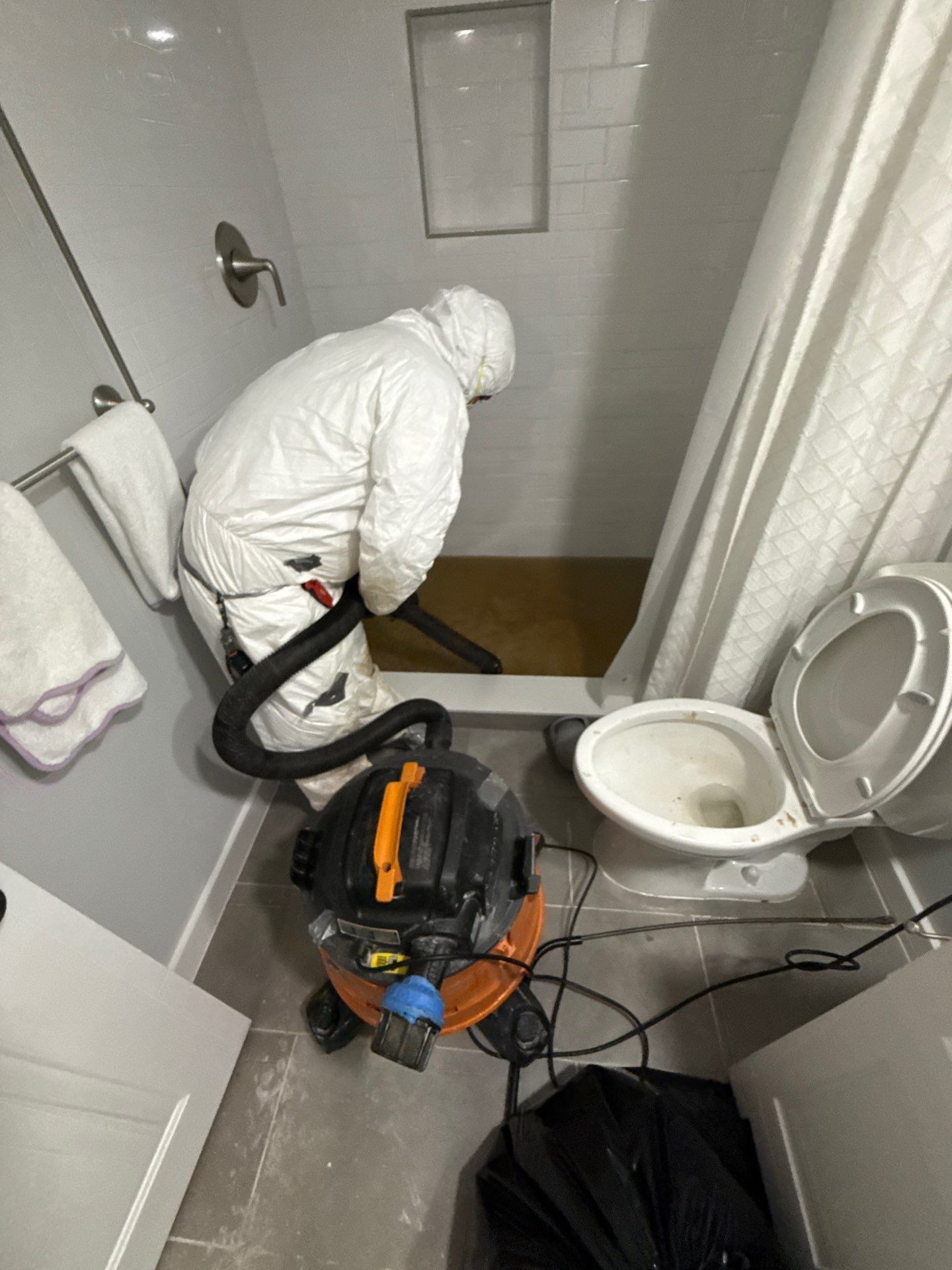 Mid-stage drying setup showing continued dehumidification and air circulation management.