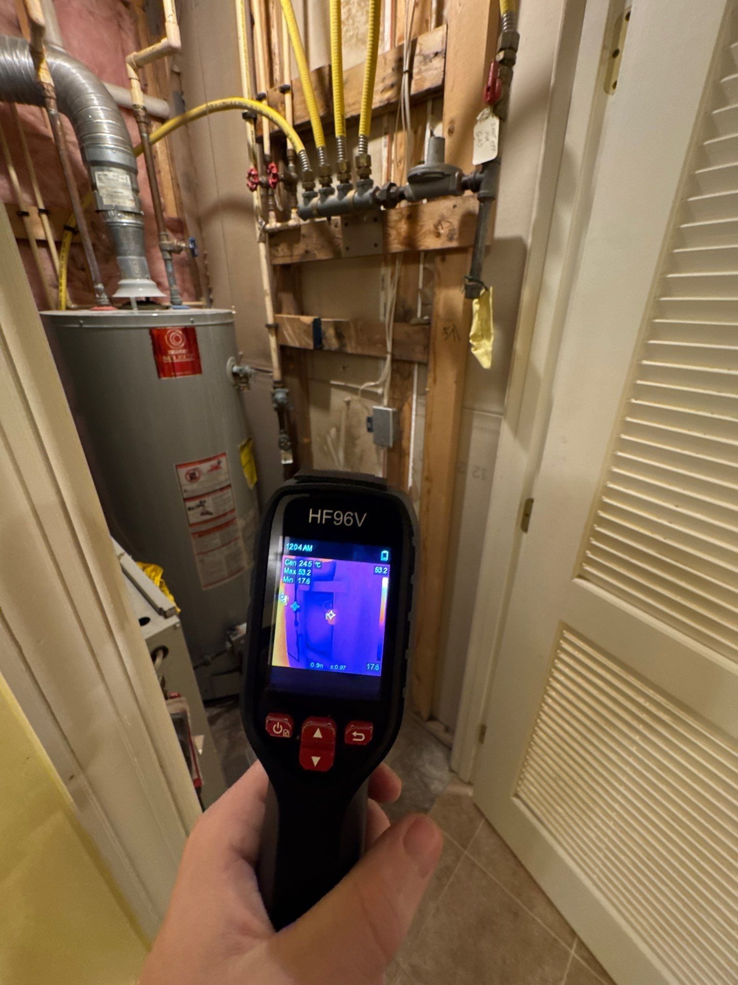 Thermal imaging inspection revealing moisture patterns during mold remediation in Chantilly.