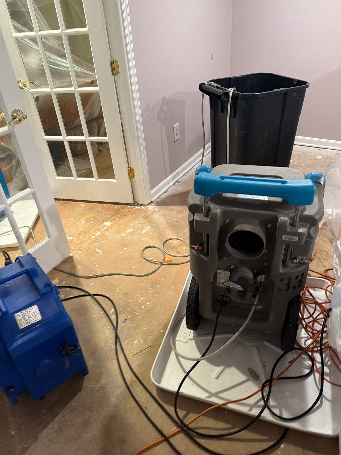 Damaged wall section marked for removal during Vienna water damage restoration process.