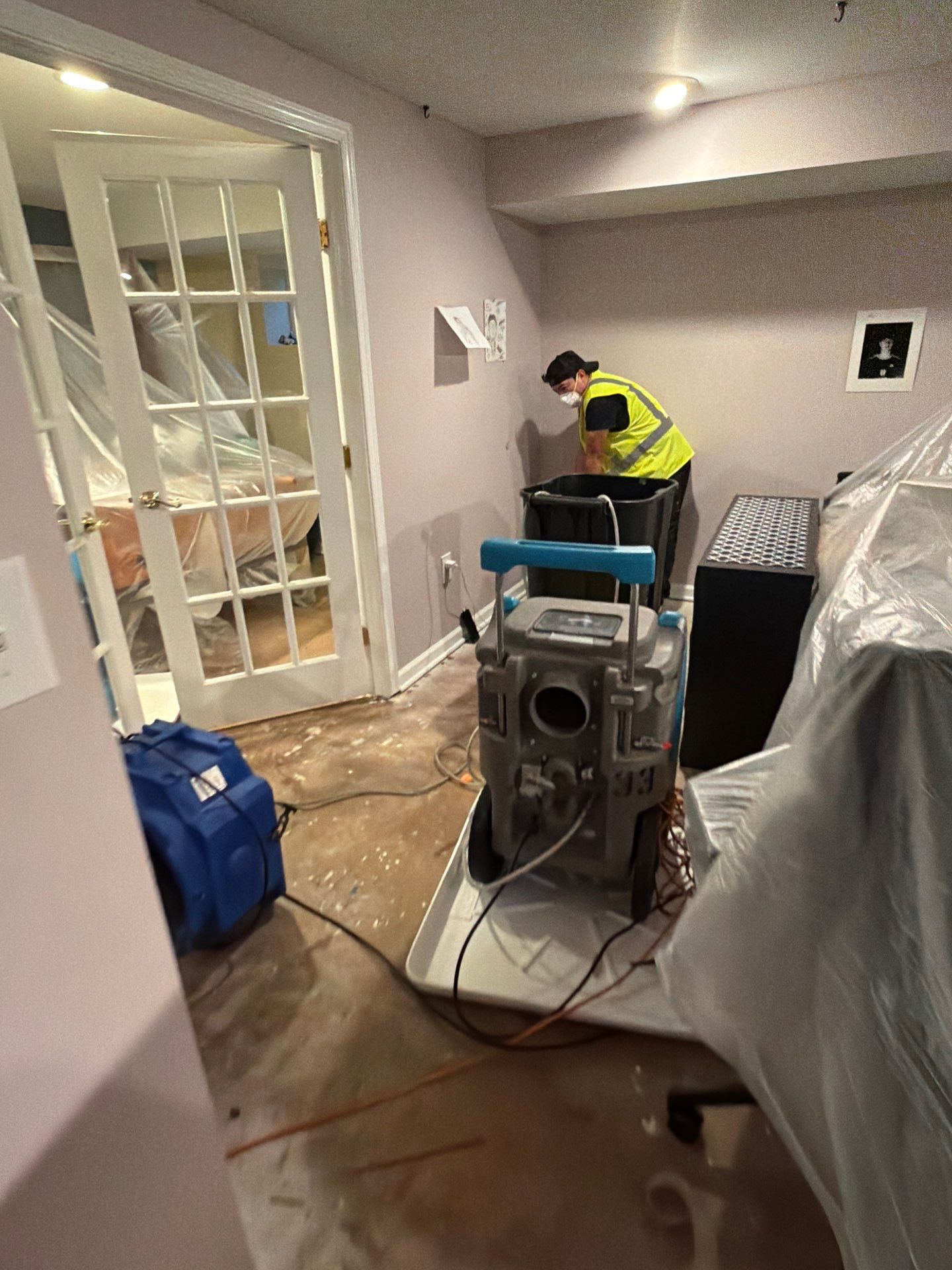 Completed wall replacement and structural restoration in Vienna water damage job.
