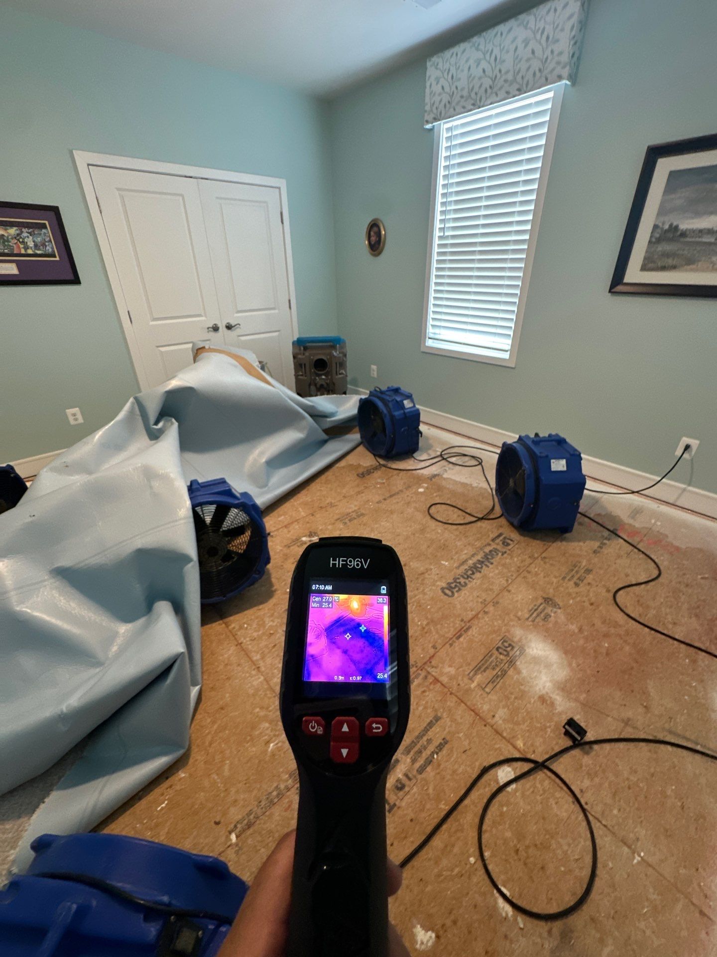 Containment and remediation work underway on affected ceiling materials.
