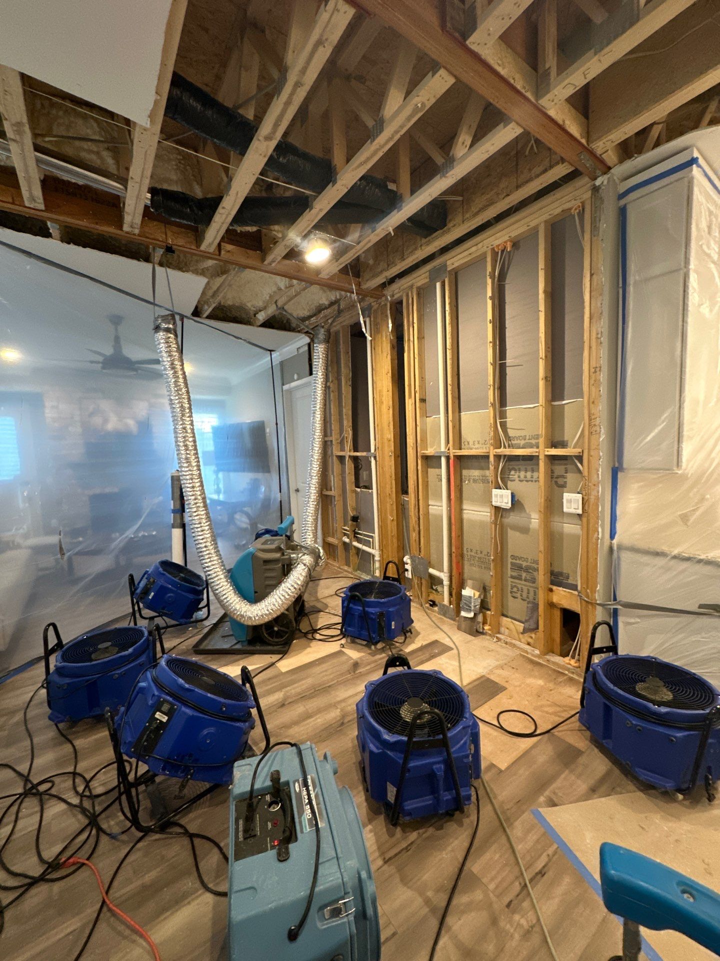 Dehumidification and air movement continuing structural drying phase of remediation.