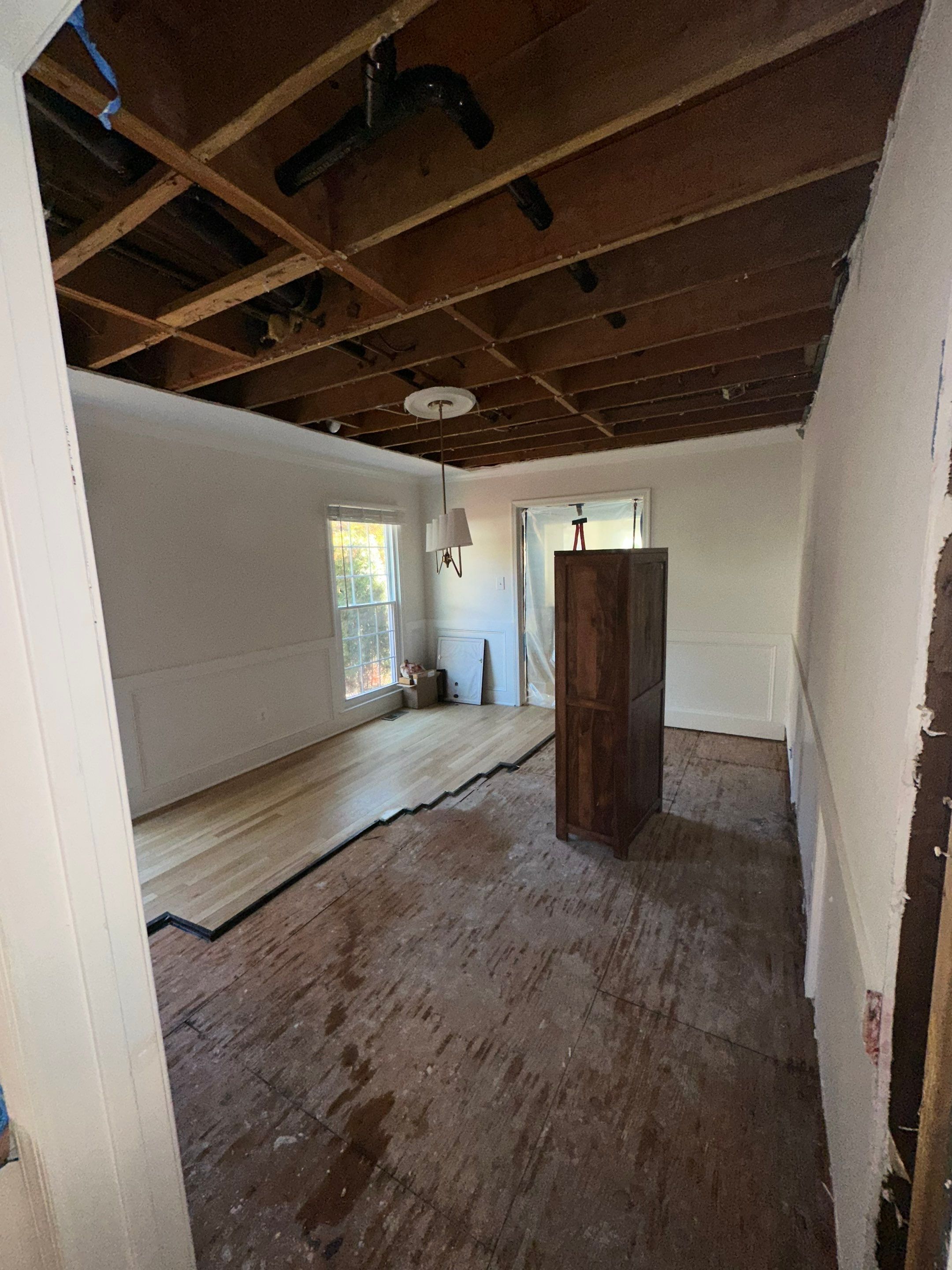 Drying phase with dehumidifiers and air movers active in contained work area.