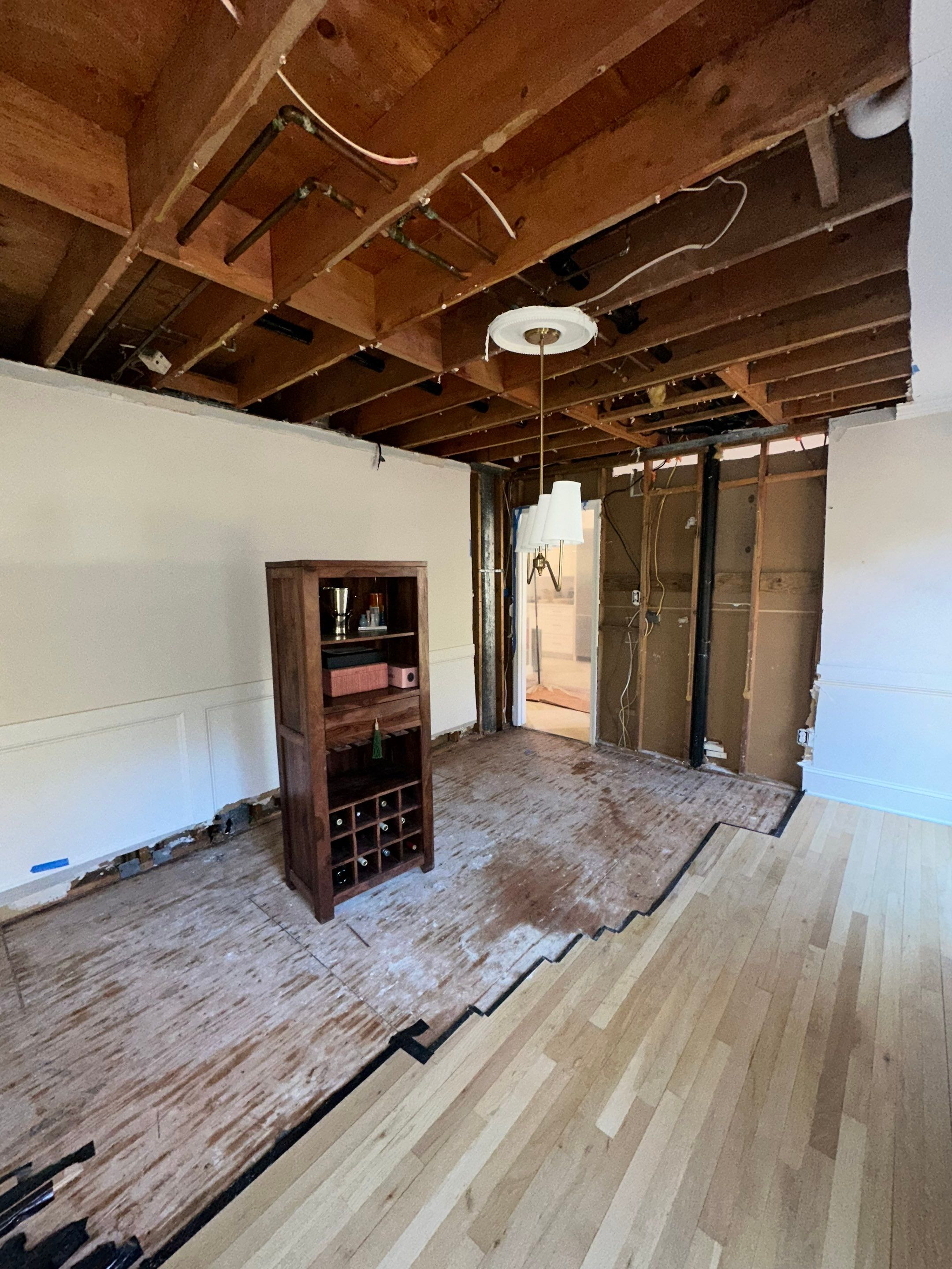 Wall replacement completion following water damage restoration in Vienna.
