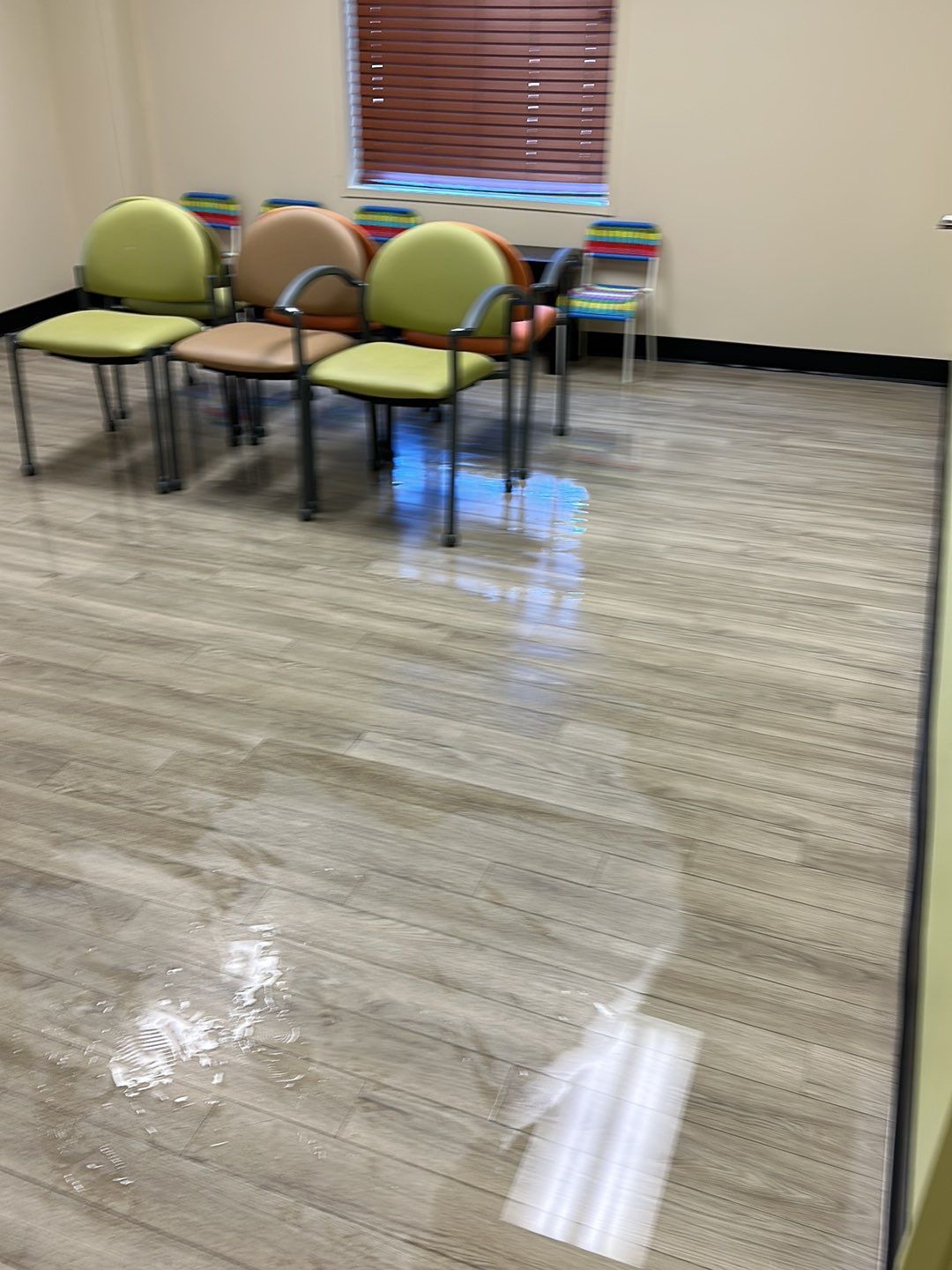 Dehumidification equipment positioned during mid-stage drying of water-damaged interior space.